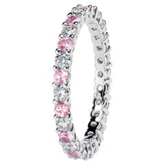 “Grace“ wedding band with diamonds and pink sapphires by Leon Mege