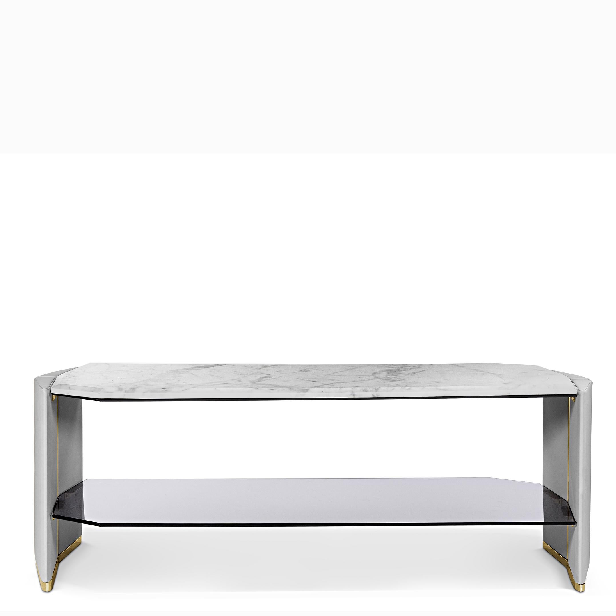 Console Table Grace White Marble Low with wooden sides covered wiht
genuine grey leather with polished brass trims and with white and grey 
marble top. Bottom top in smocked glass.