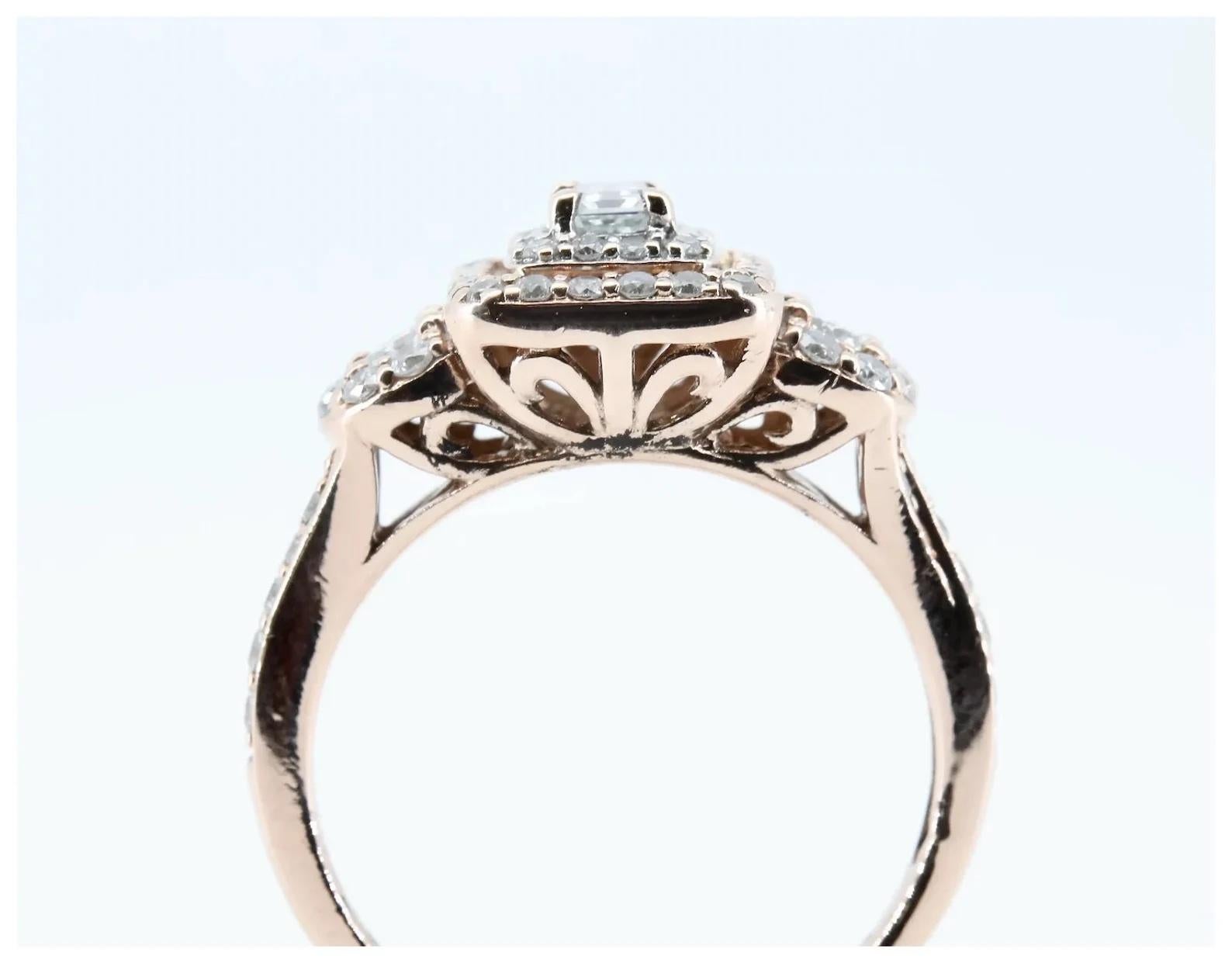 Graceful 1.00ctw Three Stone Diamond Halo Ring in 14K Rose Gold In Good Condition For Sale In Boston, MA