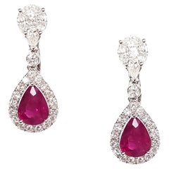 Graceful 18 Karat White Gold Ruby and Diamond Earrings - Pear Shape