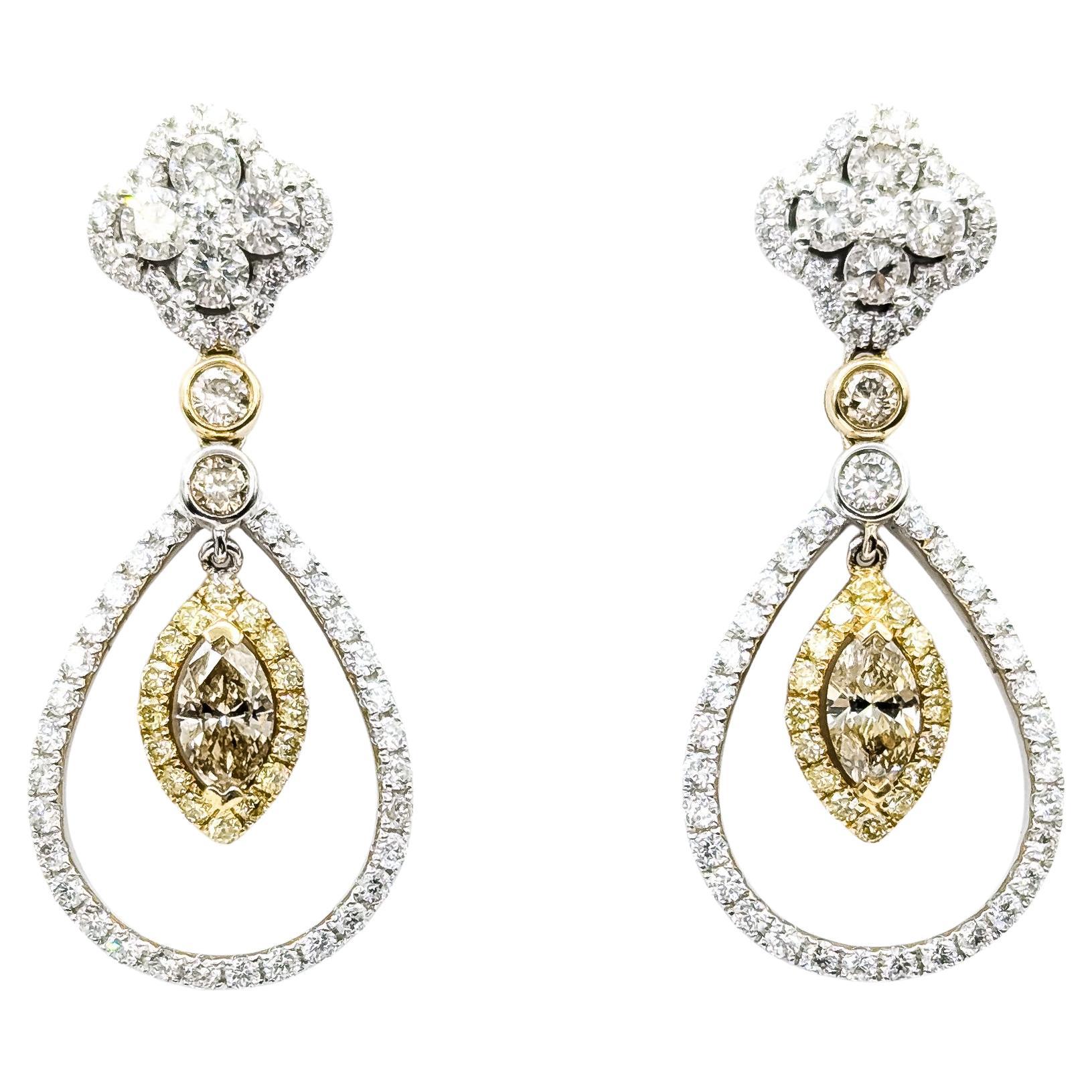 Boucles d
oreilles gracieuses en or bicolore 14k avec diamants en pampille