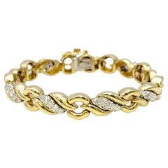 Graceful Diamond Wave and Circle Link Bracelet 18 Karat Yellow and White Gold