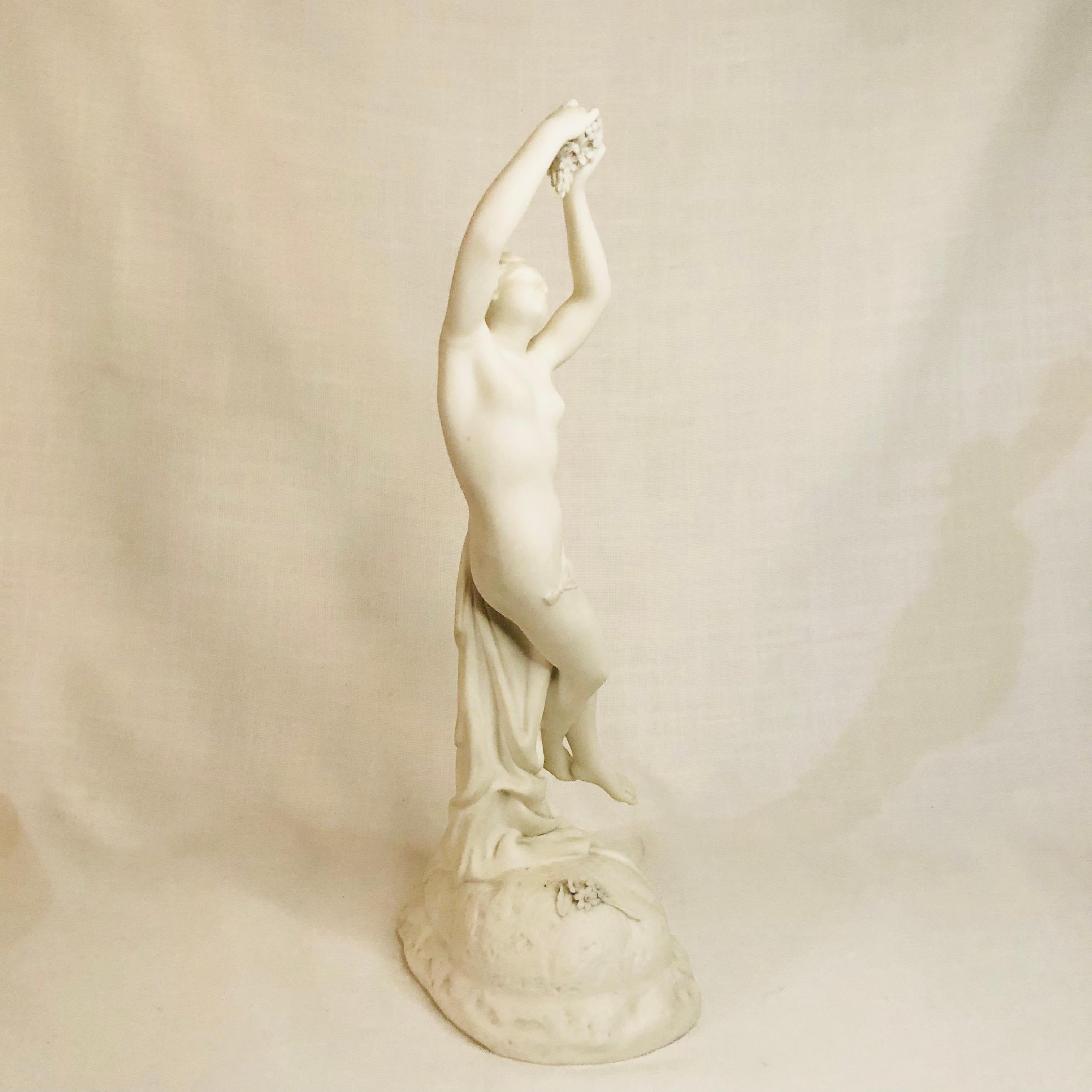 Unglazed Graceful English Parian Statue of Semi-Nude Lady Holding Grapes above Her Head