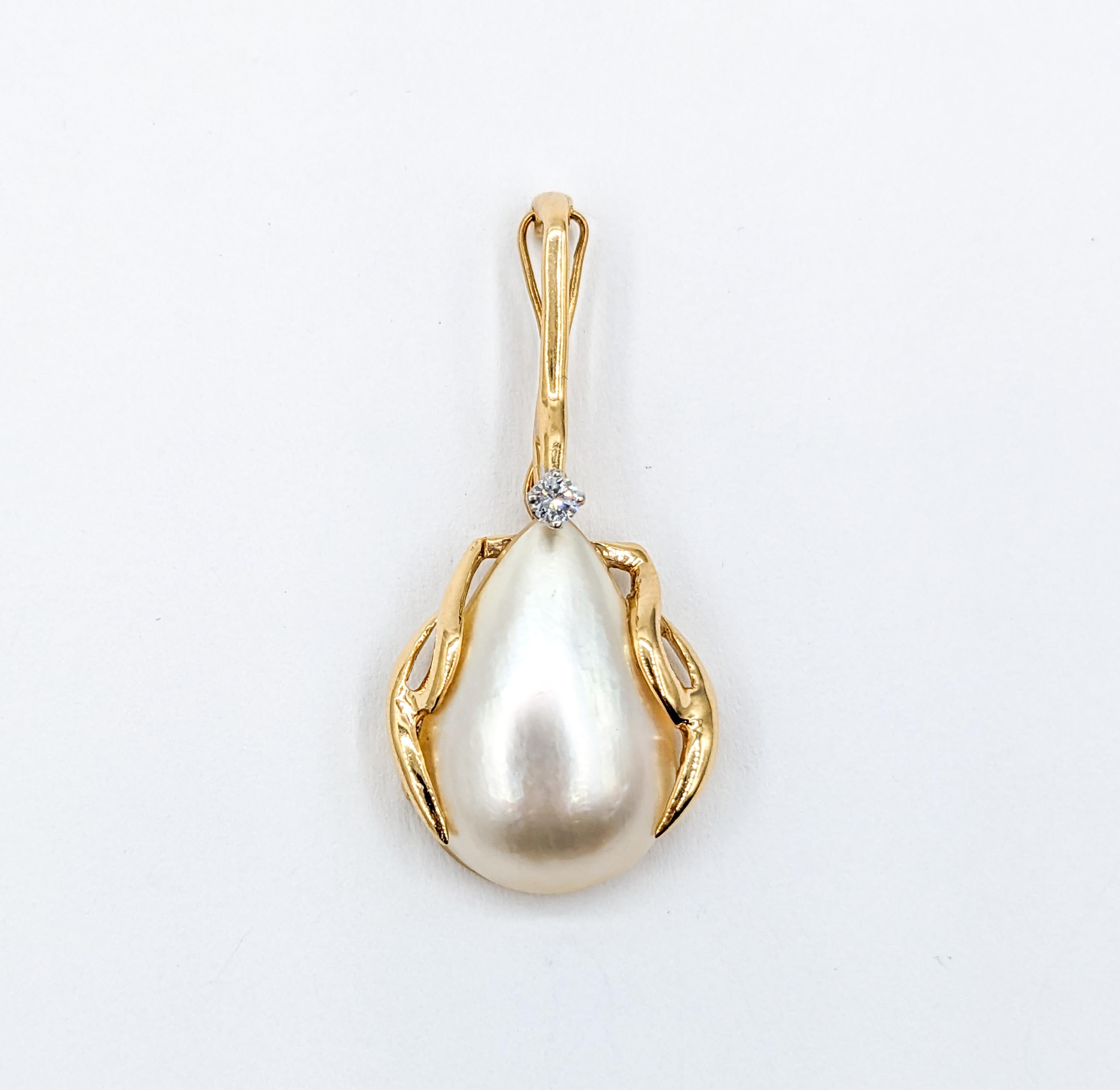 Graceful Mabe Pearl & Diamond Enhancer Pendant

Introducing our exquisite enhancer, a fusion of timeless allure and modern craftsmanship. Meticulously fashioned in 14k yellow gold, at its top lies a .03ct round diamond that radiates with an SI