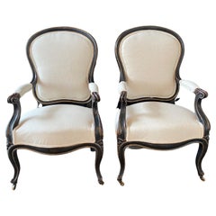 Graceful Pair of 19th Century French Napoleon III Ebonized Salon Armchairs