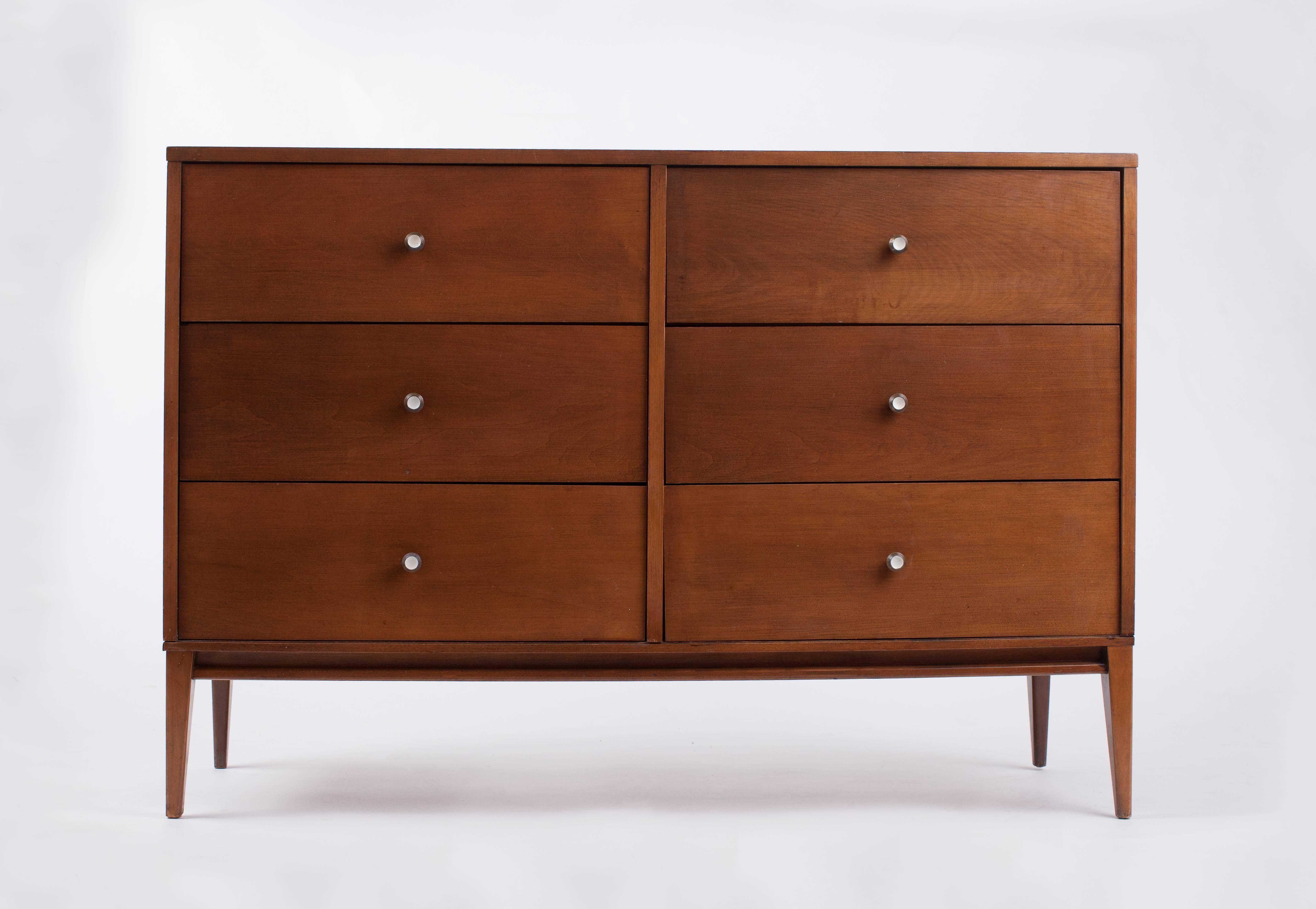 Paul McCobb (1917–1969)

Clean-lined six-drawer dresser or credenza by Paul McCobb for his Planner Group by Winchendon, with angled and tapered legs, in maple with original conical brass and enamel pulls.

Stamped on inside drawer.