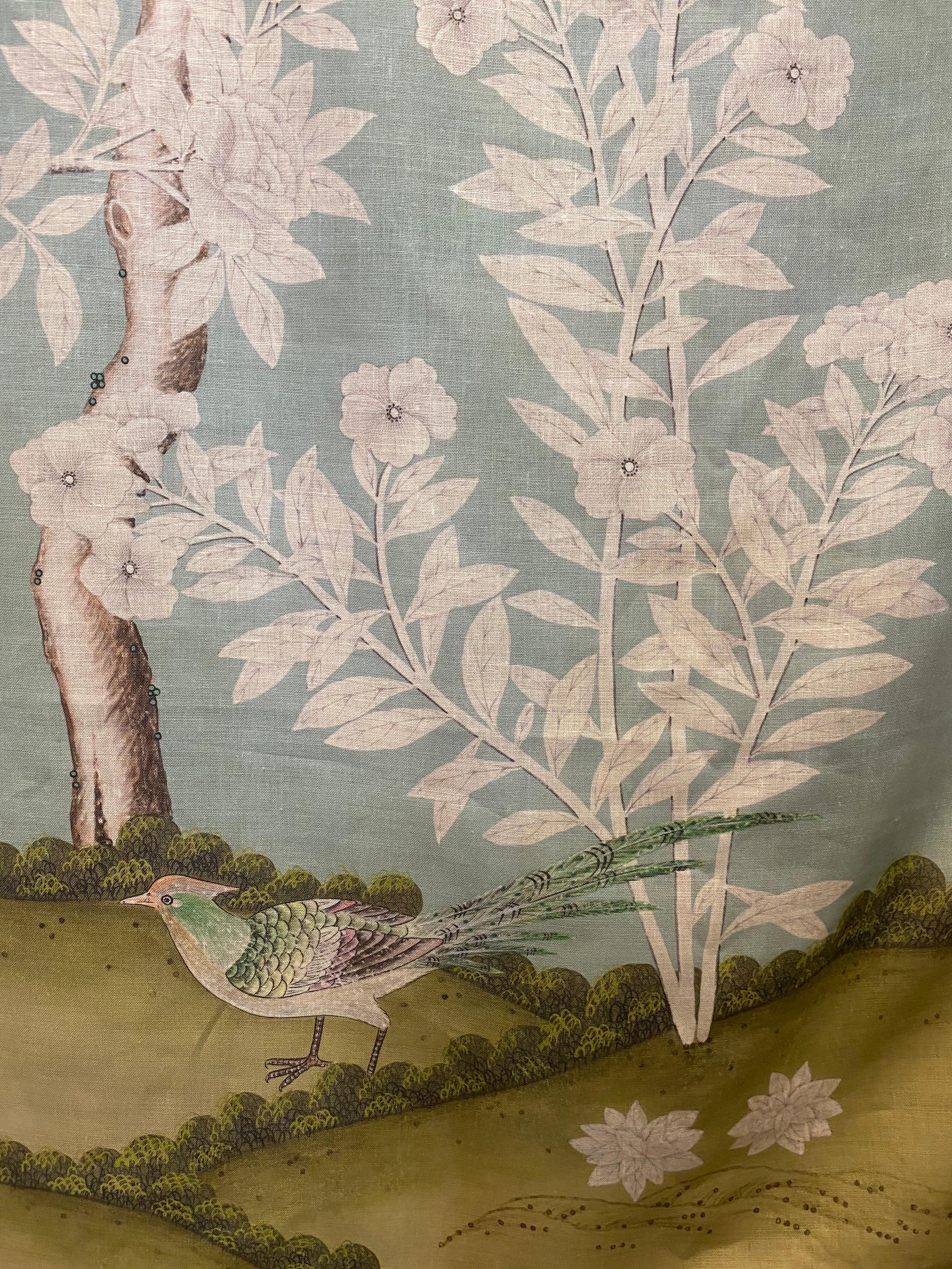 Gracie, the 5th generation firm established in 1898 and known for their exquisite hand painted wallpapers now has a line of linen fabrics featuring six of their iconic patterns.

This is Hampton Garden, with flowering trees, birds, and butterflies