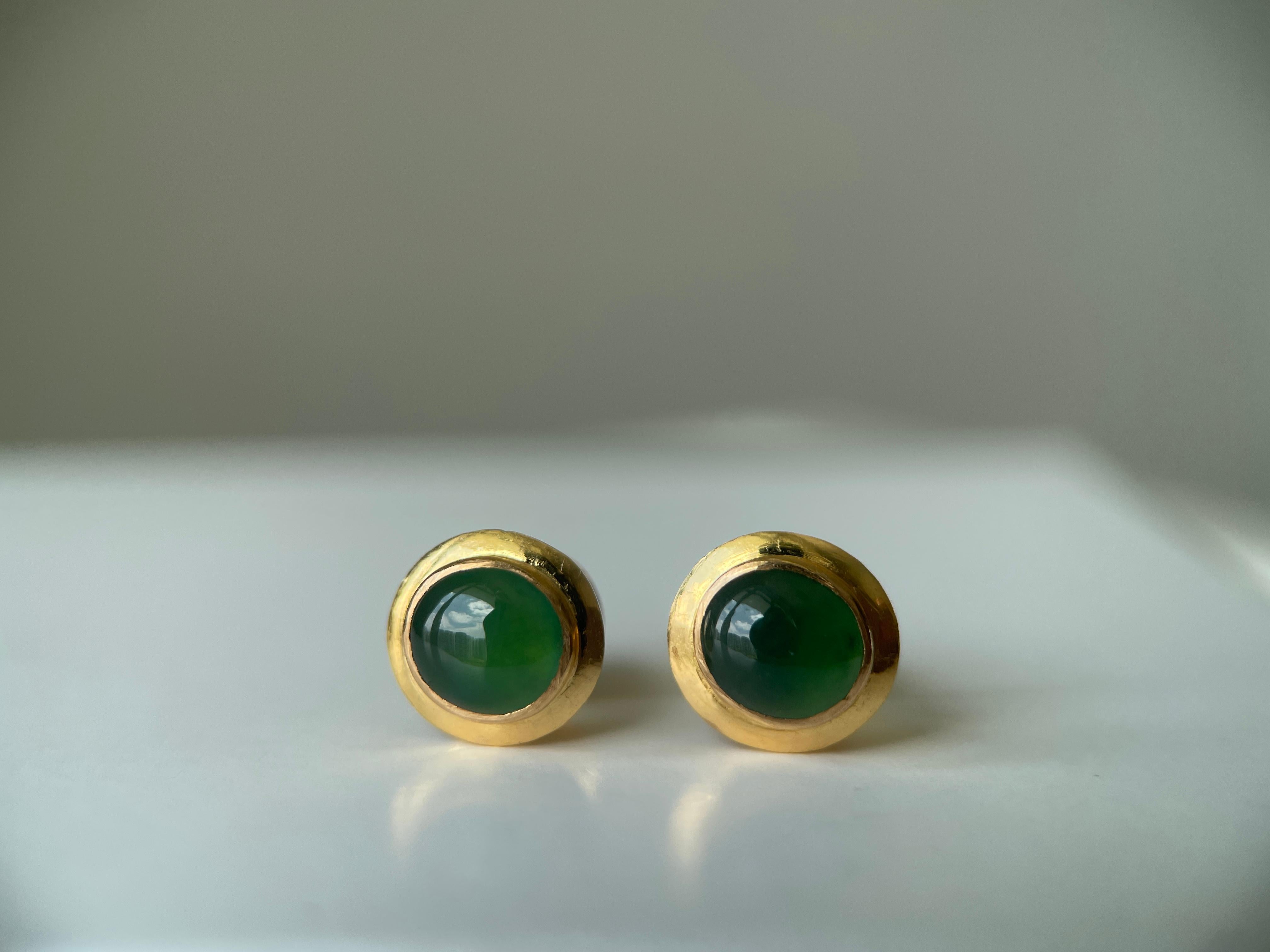These minimalist earrings feature genuine Type A Jadeite Jade from Burma, known for its beauty and rarity. The jade is highly translucent with a lovely green hue, showcasing fine grain texture and well-balanced color that enhances its natural