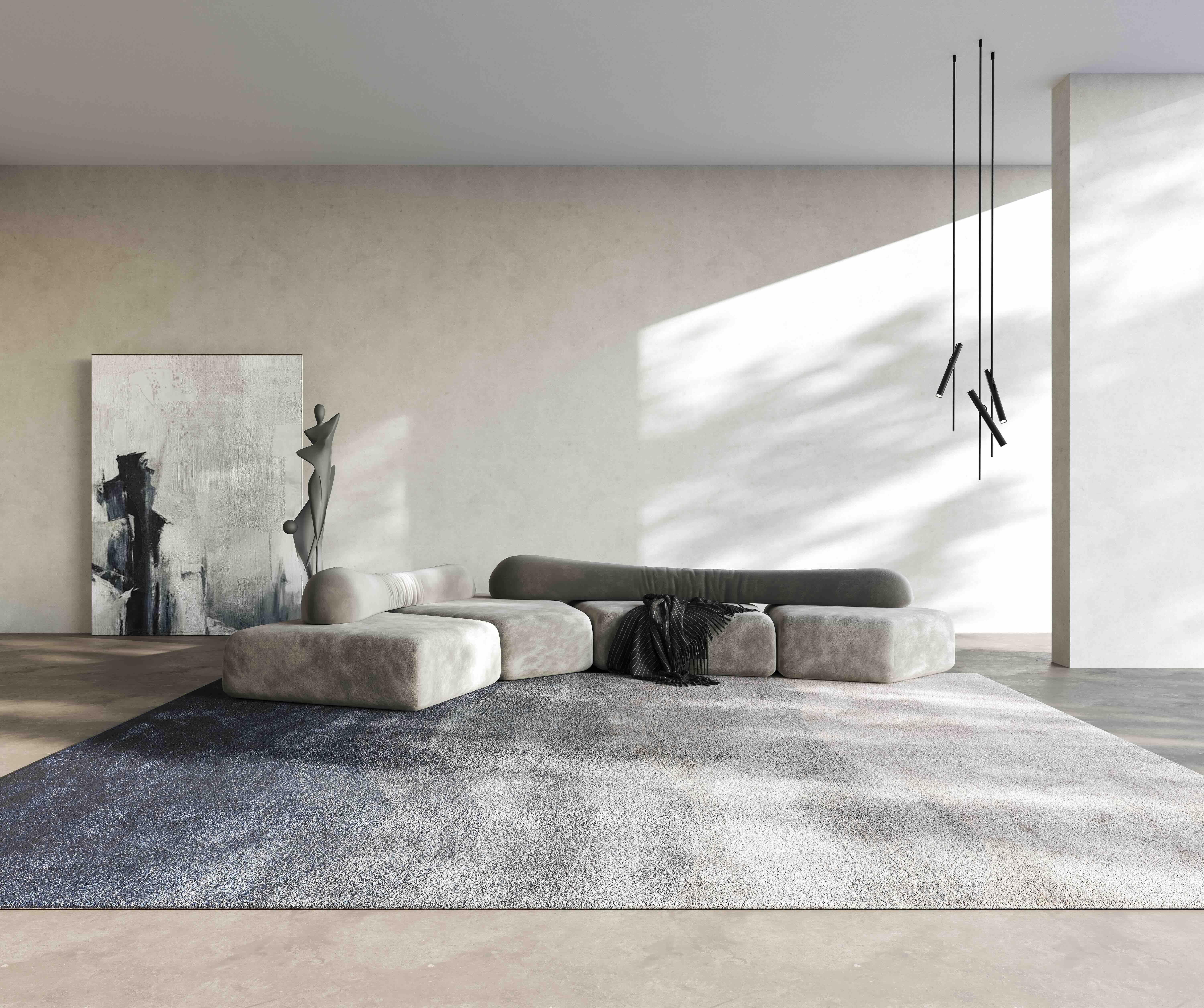 A Modern Statement in Gradient Luxury
This hand-tufted rug blends the softness of premium New Zealand wool with the subtle sheen of natural silk, creating a smooth gradient that moves from ash grey to deep midnight blue. The piece is crafted in
