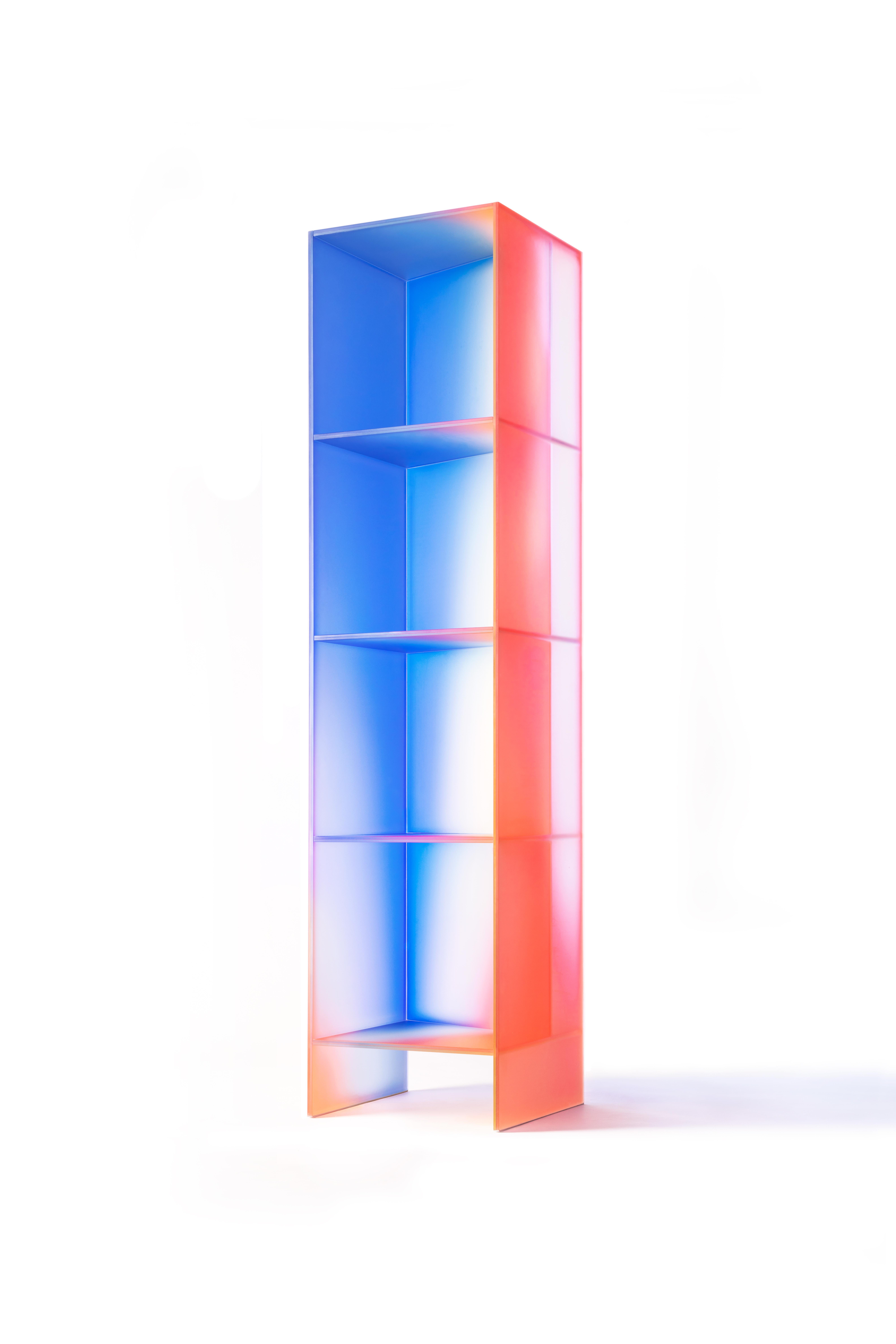 'HALO' collection by Buzao - Bookcase or shelves
Laminated dichroic glass, gradient colors 
42 x 40 x H 180 cm

Studio Buzao from Guangzhou (China) is exploring innovation with furniture and lighting design. From marble to lava stone, from