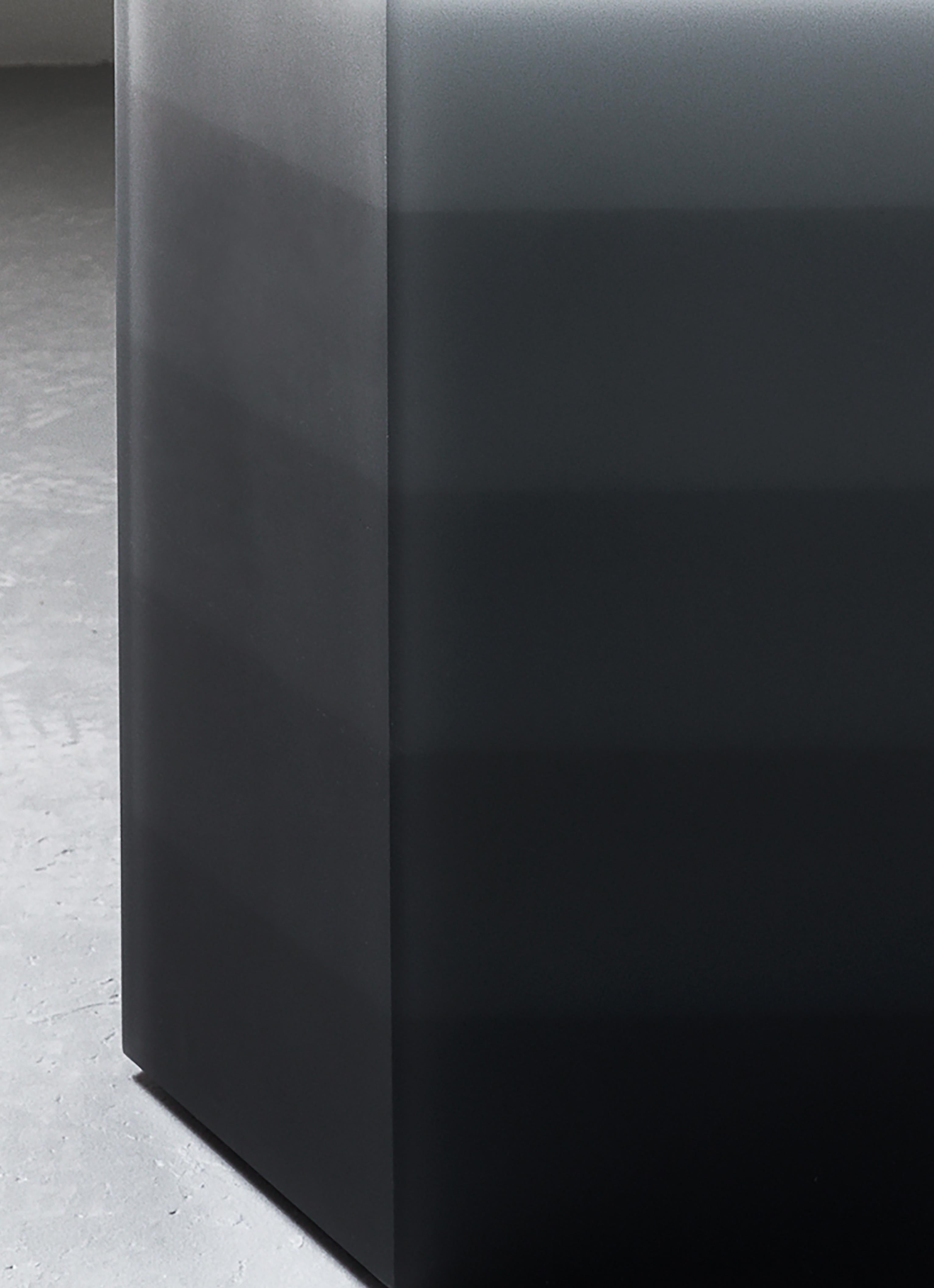 This ombre resin side table by Facture Studio goes beyond a simple accent piece to make a commanding statement. Hexagonal in shape, it is meticulously crafted from five layers of ascending color saturation, gradually shifting from dark to light in a