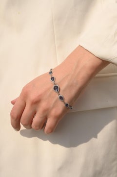 Gradient Pear Cut Sapphire and Halo Diamond Bracelet in 14k White Gold