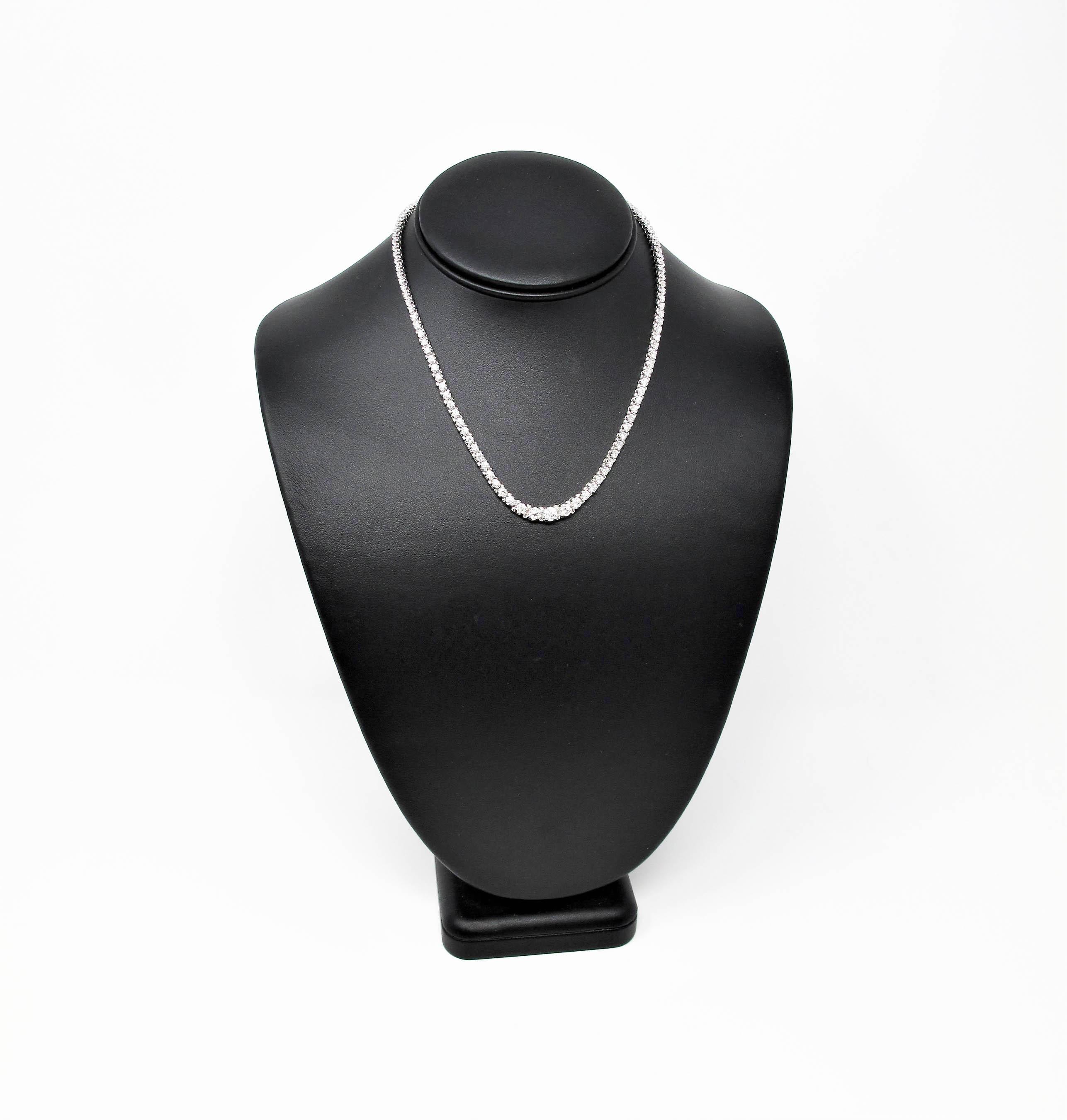 This elegant, graduated diamond necklace will be your go-to necklace for all occasions. Its  timeless style and simple clean lines will elevate any look that it's paired with. It offers incredible sparkle without being over the top. Pair it with