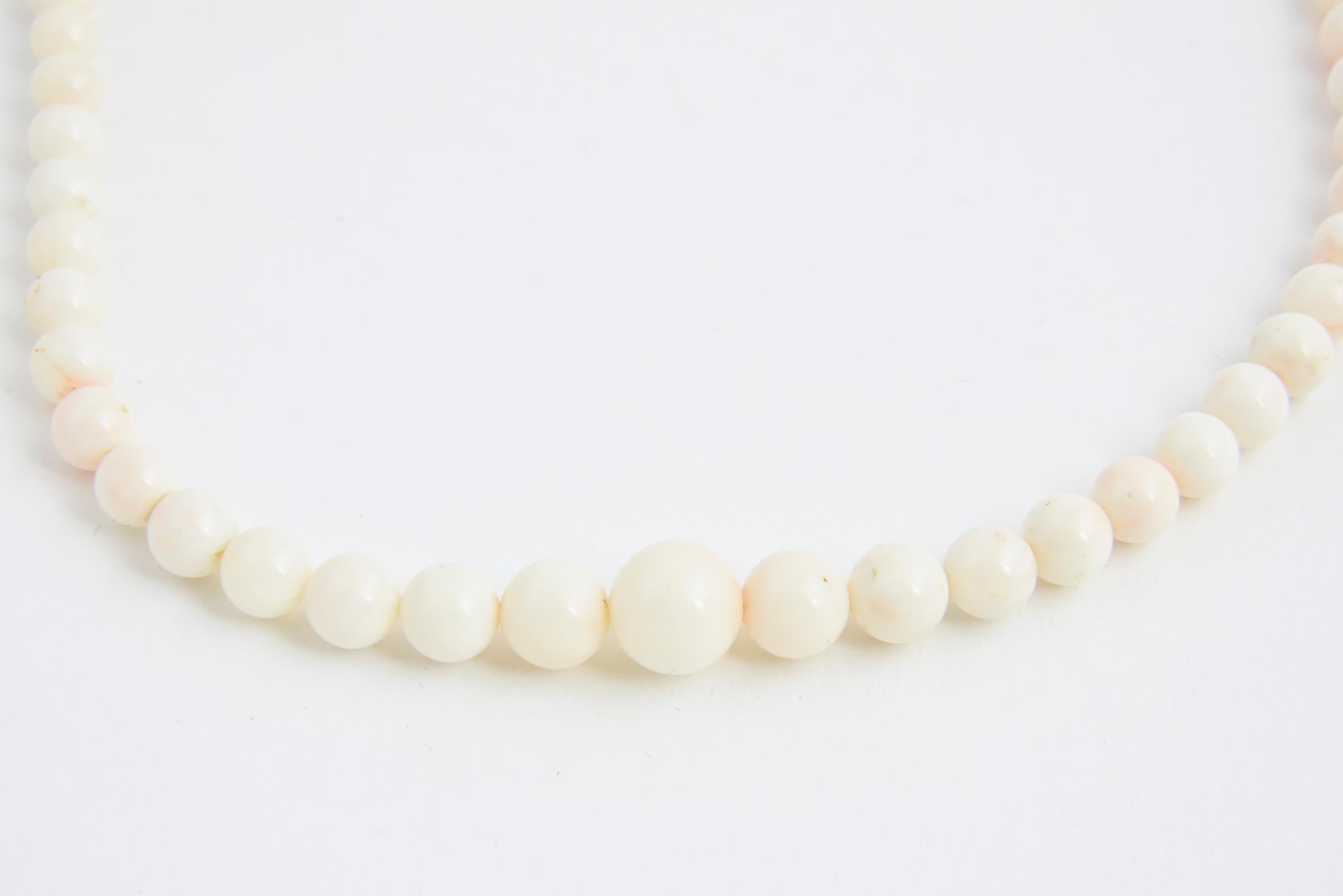 white angel skin coral beaded