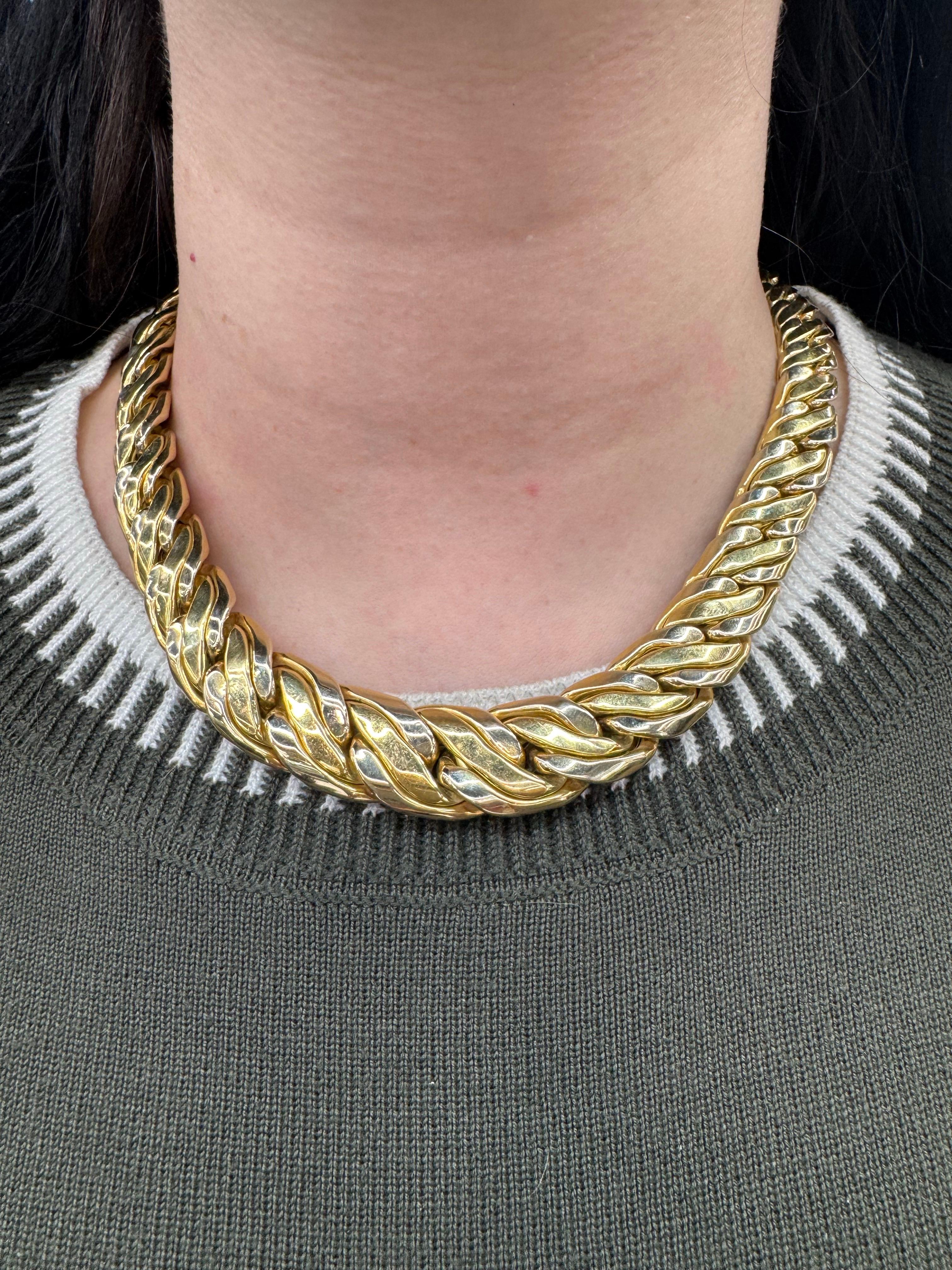 18 Karat yellow gold necklace featuring a graduated braided motif weighing 87.7 grams, 17.5 inches.
Large link measures 0.65 inches to 0.41 inches. 