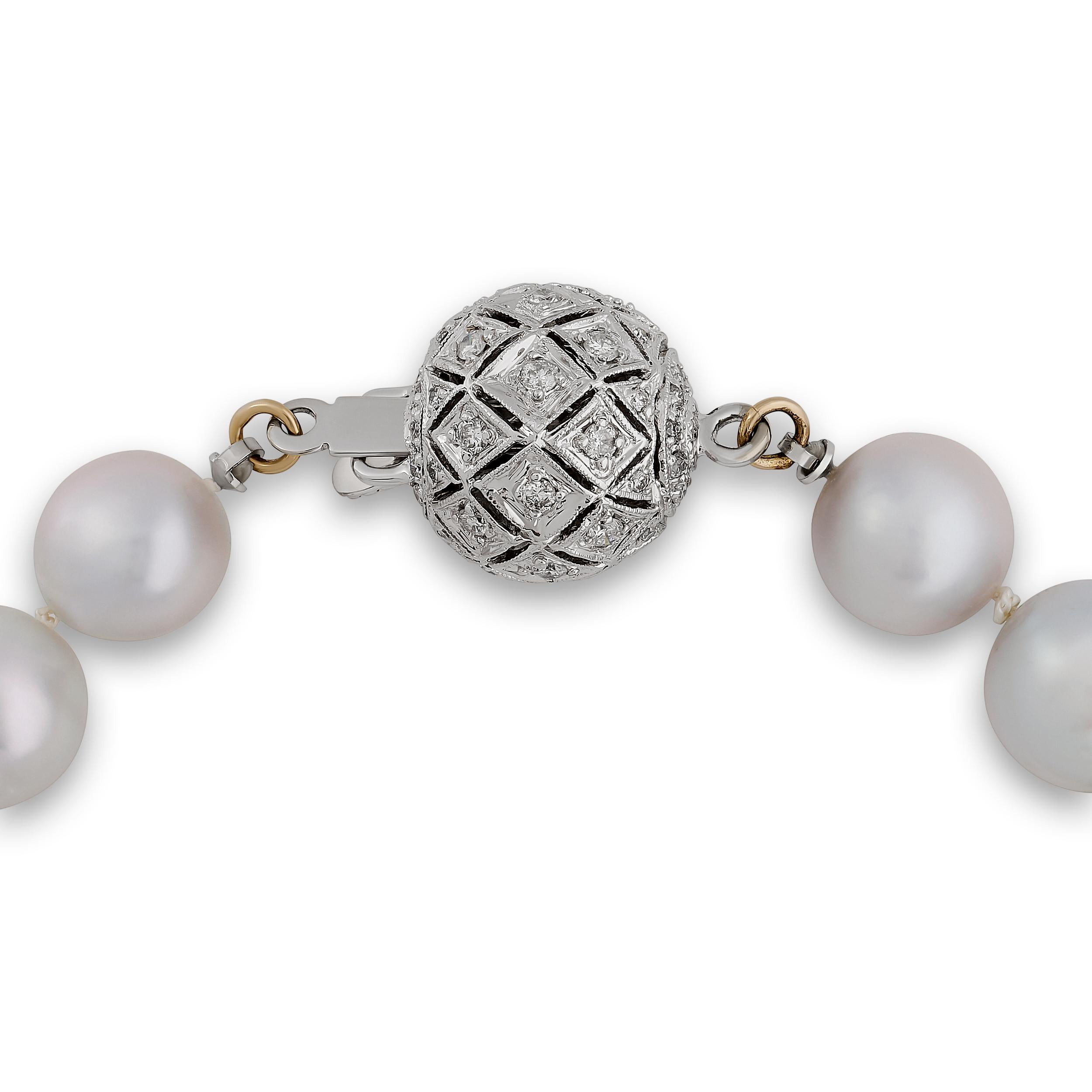 Round Cut Graduated Cultured South Sea Pearl Necklace with an 18KWG Diamond Ball Clasp For Sale