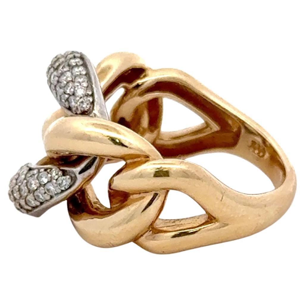 14 Karat yellow gold fashion ring featuring a diamond center Cuban link containing 78 round brilliants, 0.52 carats, with graduated high polished links.
Color G
Clarity VS1-VS2