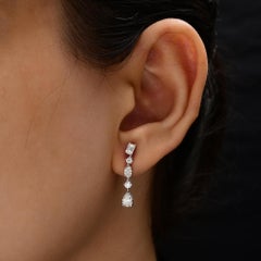 Graduated Diamond Drop Earrings with Pear and Emerald Cuts in 18K White Gold