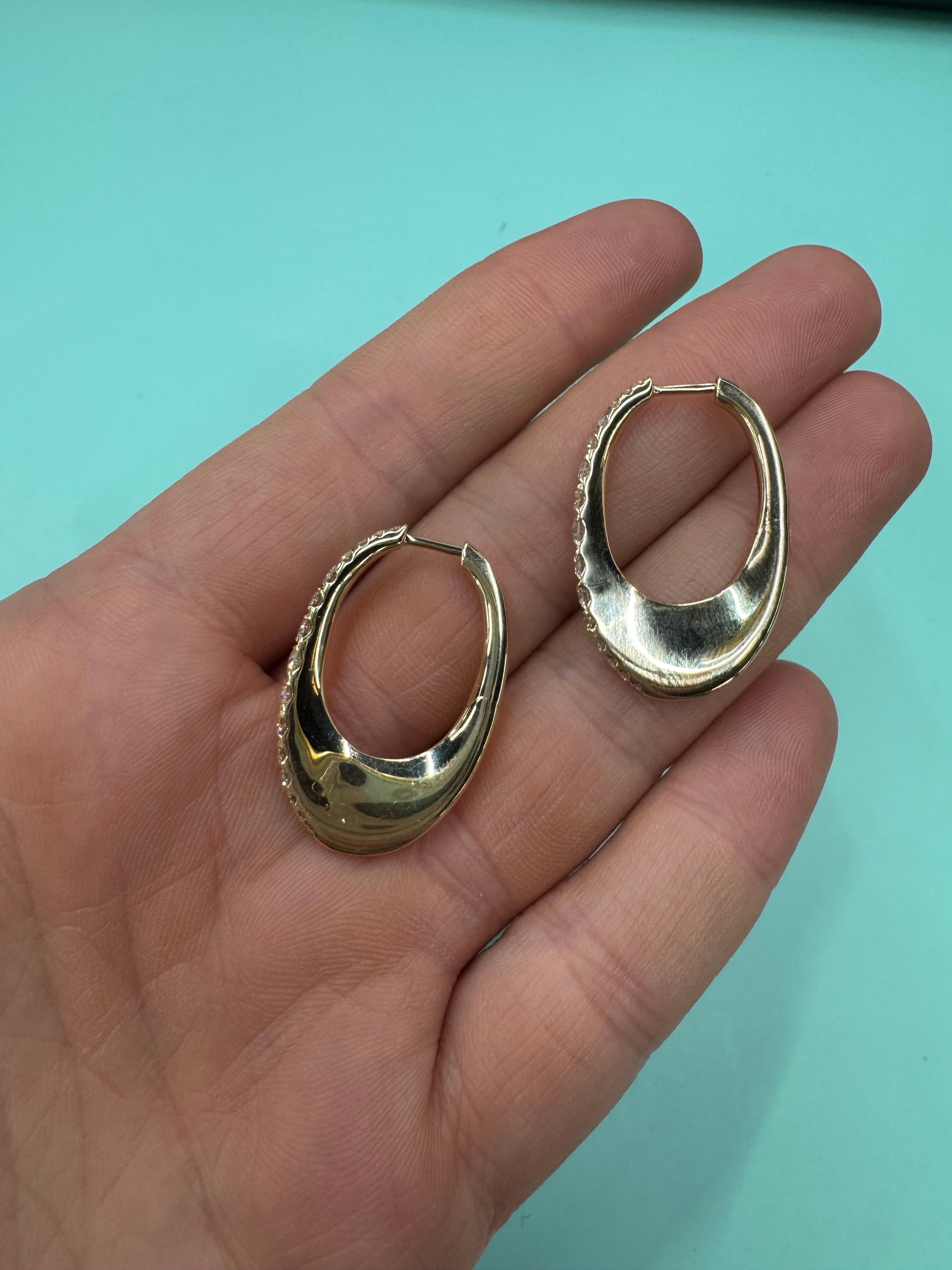 Graduated Diamond Oval Shape Hoop Earrings 1.08 Carats 14 Karat Yellow Gold For Sale 3