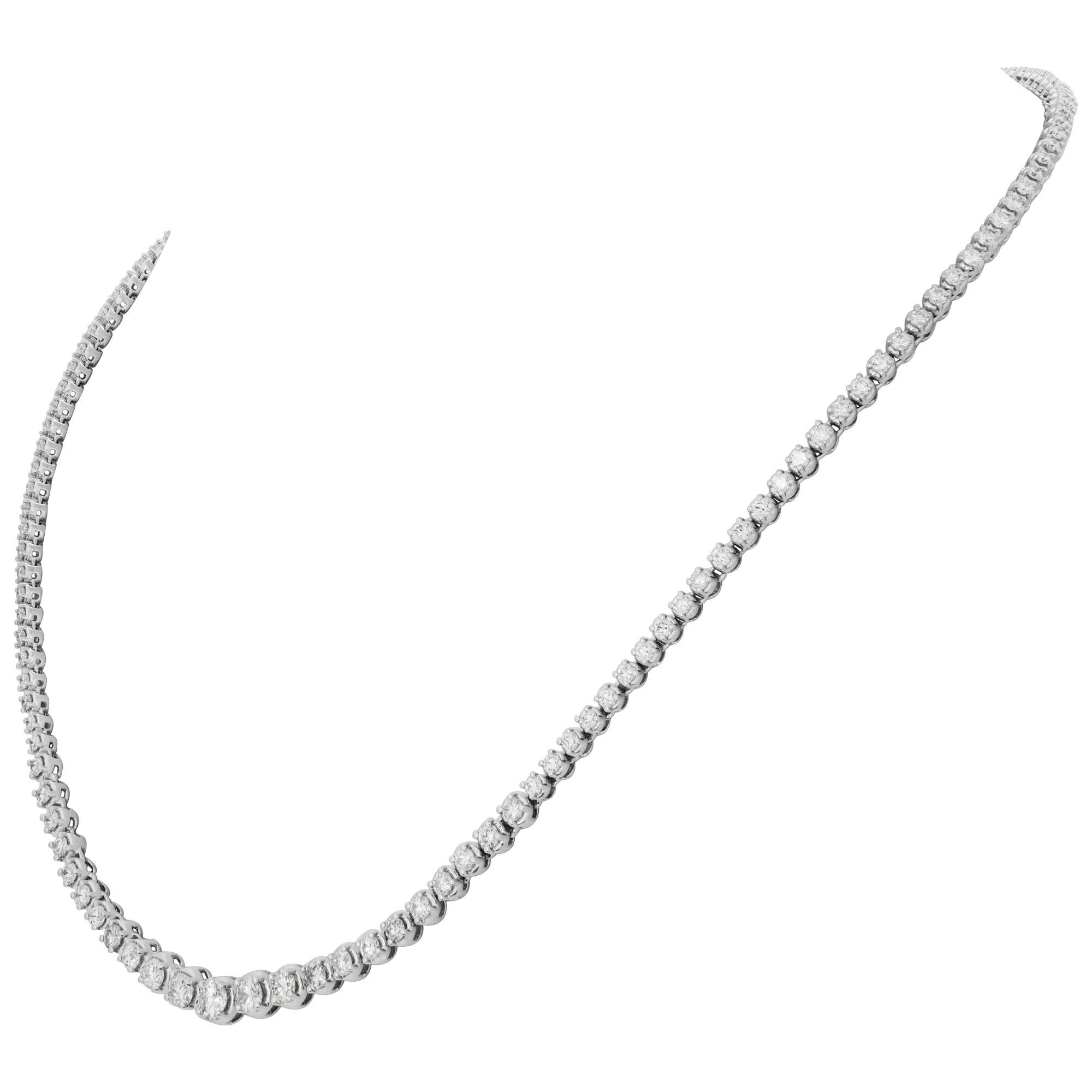 Graduated diamonds line necklace in 18k white gold. Round brillliant cut diamonds total approx. weight: 6.00 carats, estimate: H-I color, SI clarity. Length 17 inches.
