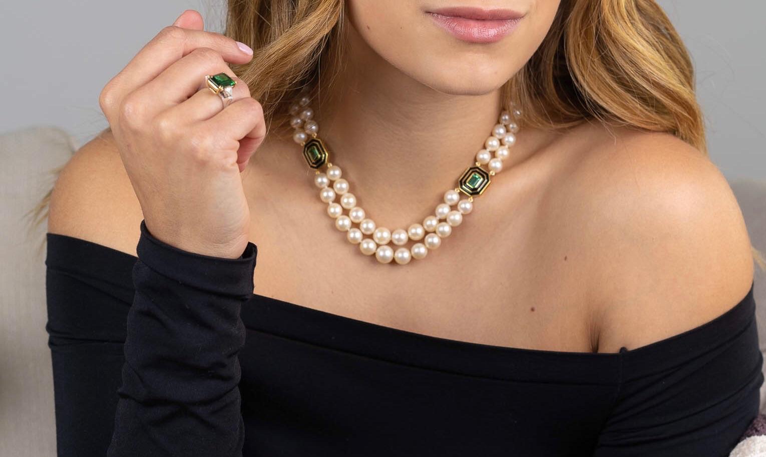 Estate Japanese Cultured Akoya Pearls meet a Modern styling in the Museum Series necklace by Andrew Glassford. The Beautiful Cream Colored Double Strand of Graduated Pearls are divided at 4 and 8 o'clock positions by 3.04 carats of Brazilian