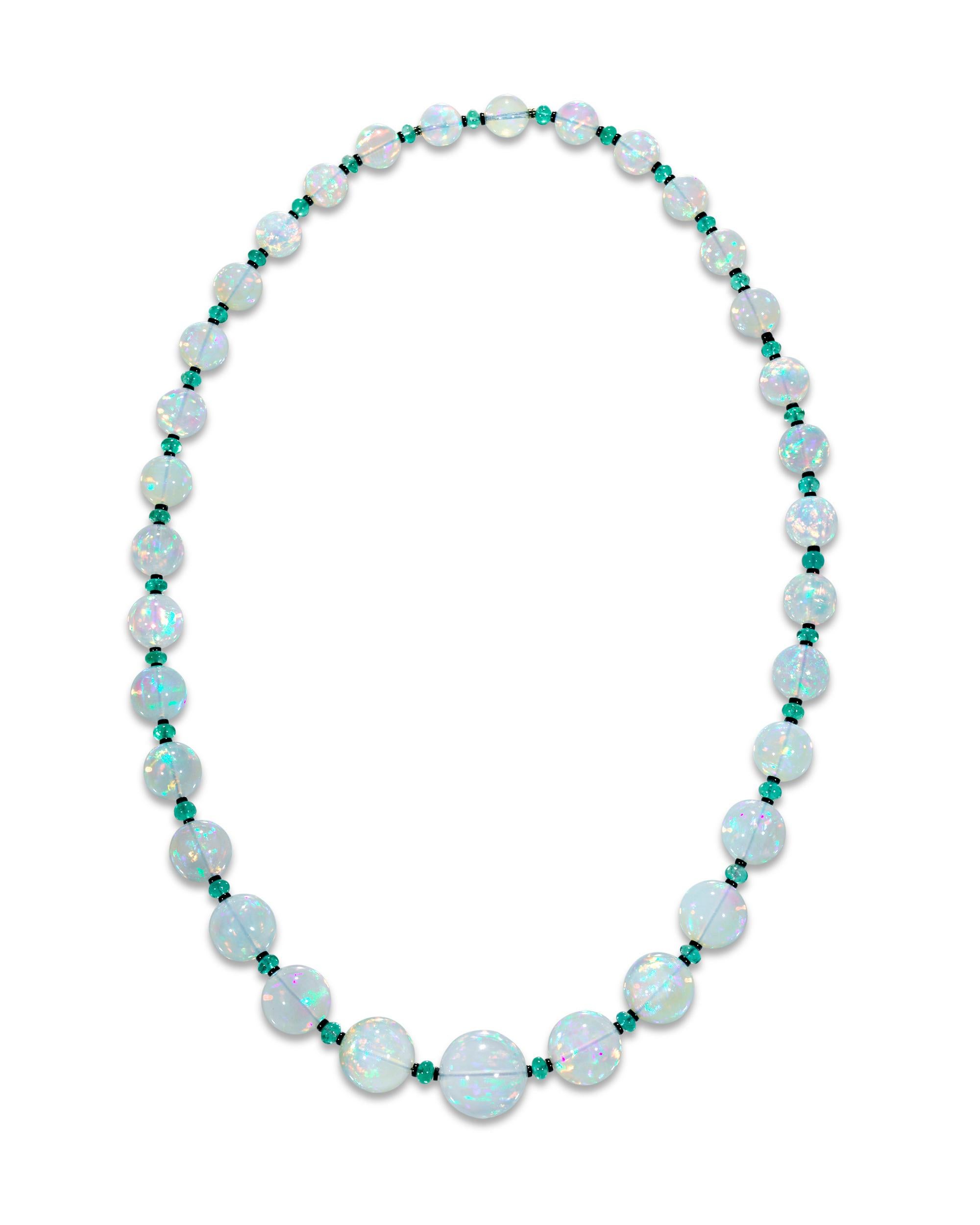 Thirty-three monumental Ethiopian opal beads totaling approximately 436.00 carats comprise this mesmerizing necklace. The graduated gems are not only impressive in size, but each exhibits a high level of translucence and extraordinary play of color.