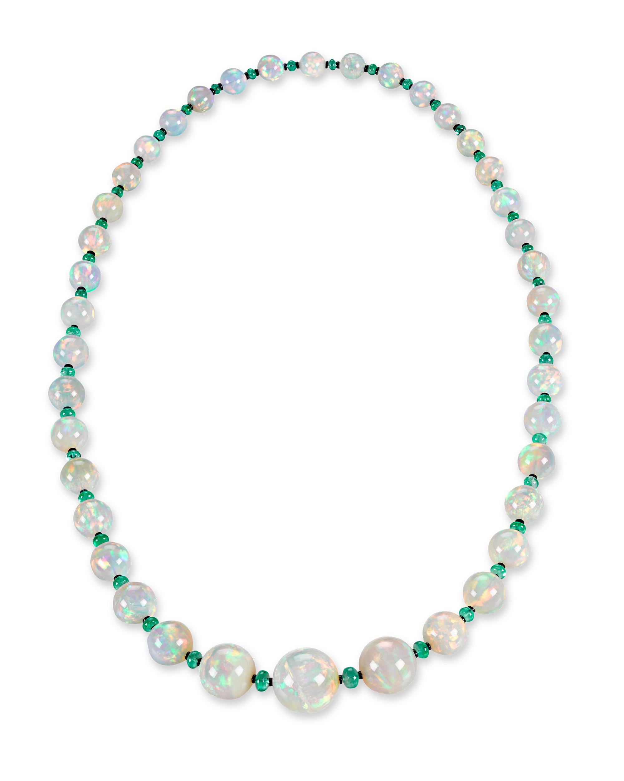Forty monumental Ethiopian opal beads totaling 490.80 carats comprise this mesmerizing necklace. The graduated gems are not only impressive in size, but each exhibits a high level of translucence and extraordinary play of color. Opals are not cut