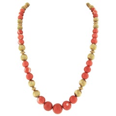 Retro Graduated GIA Round Coral Bead and Textured 14 Karat Gold Spacer Necklace