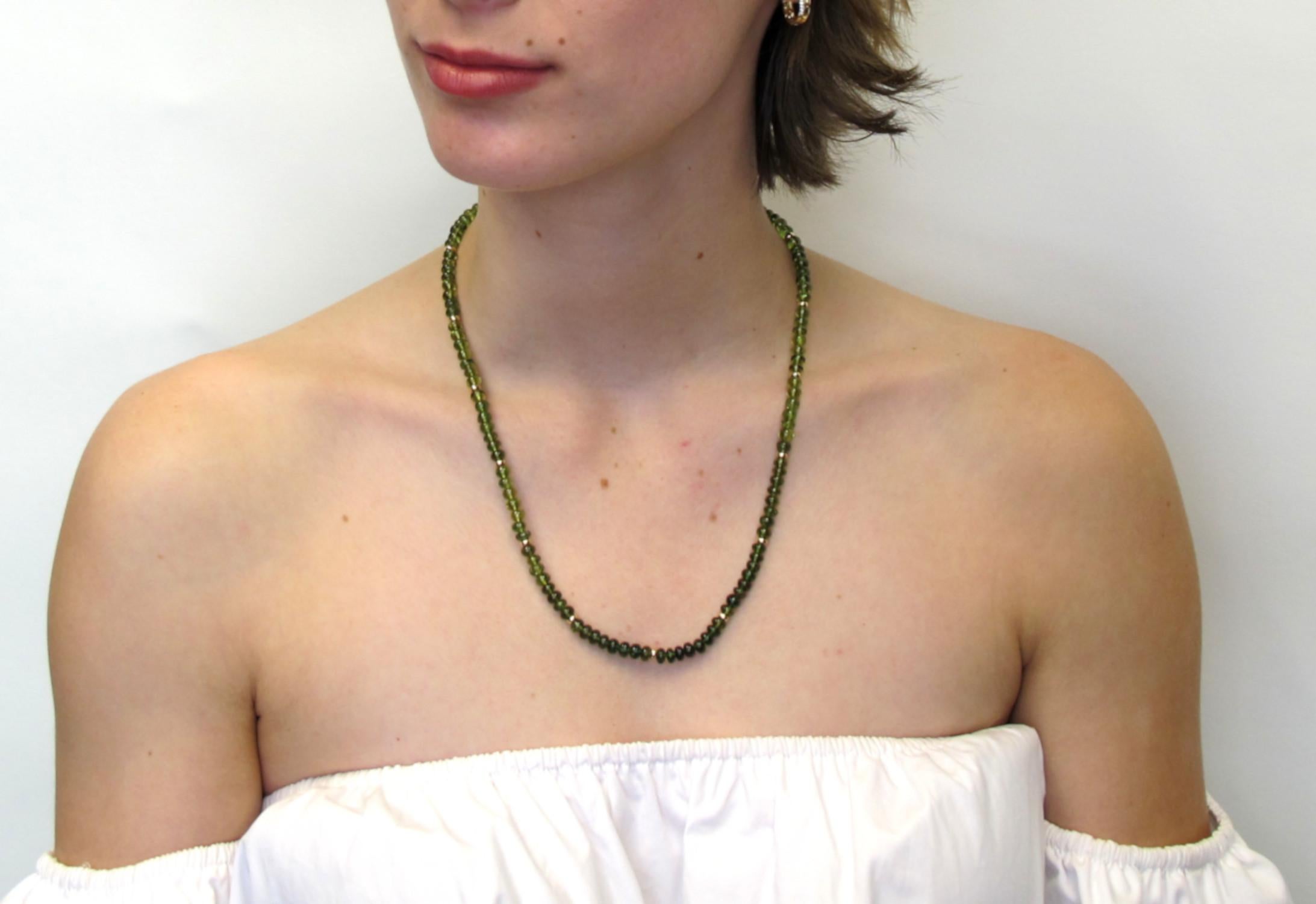 This beautiful idocrase bead necklace showcases colors that range from lime green to rich forest green! Idocrase is also known as Vesuvianite, having been named after Mount Vesuvius, where this lovely silicate mineral was first discovered. These
