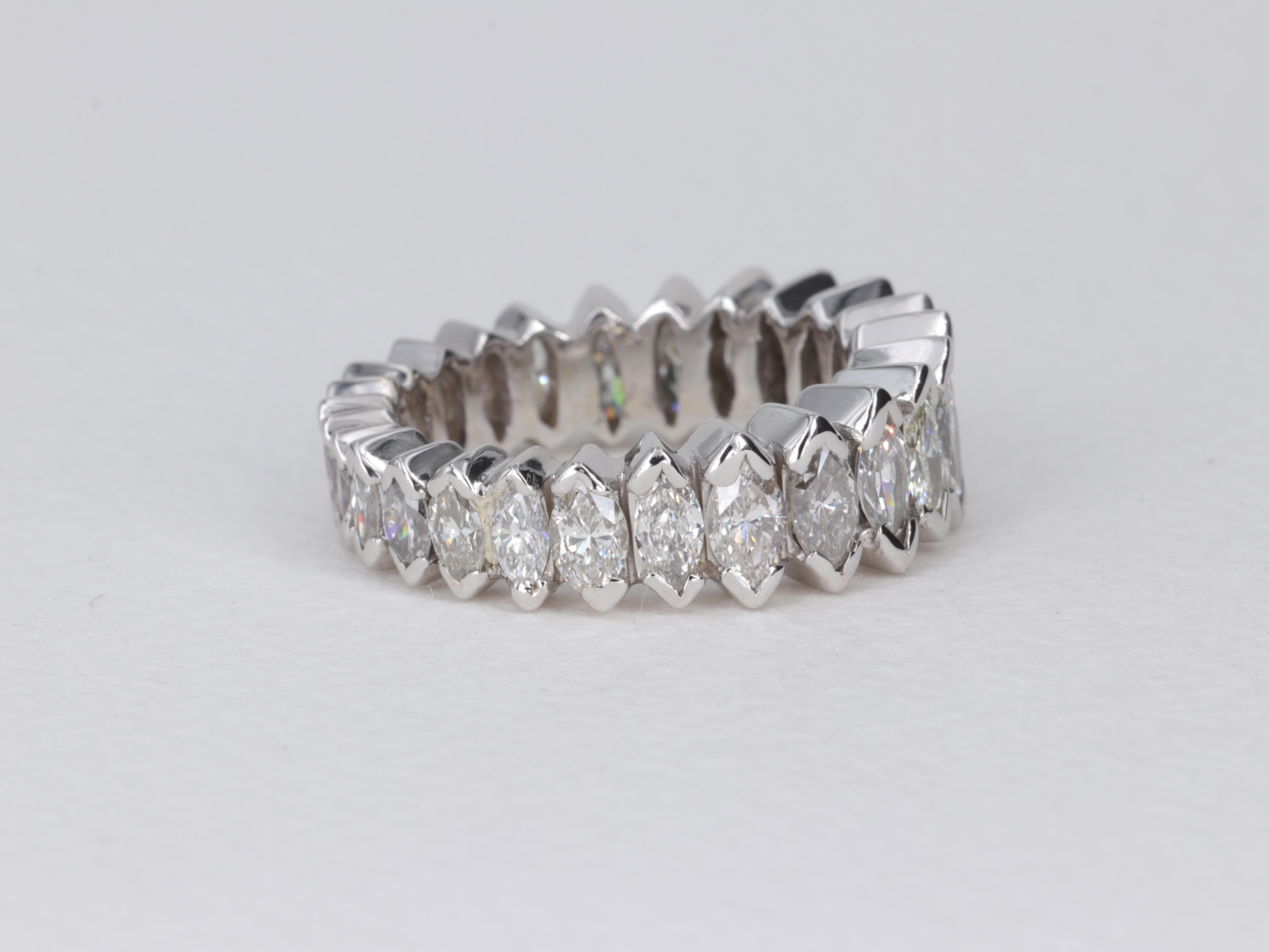 Graduated Marquise Diamond Eternity Band

Set with approximately 3 Carats of Marquise Cut Diamonds in 14 Karat White Gold

The diamonds range in color from F-J and in clarity from VS-I2.

The band does contain 3 diamonds with minor chips. 

Finger