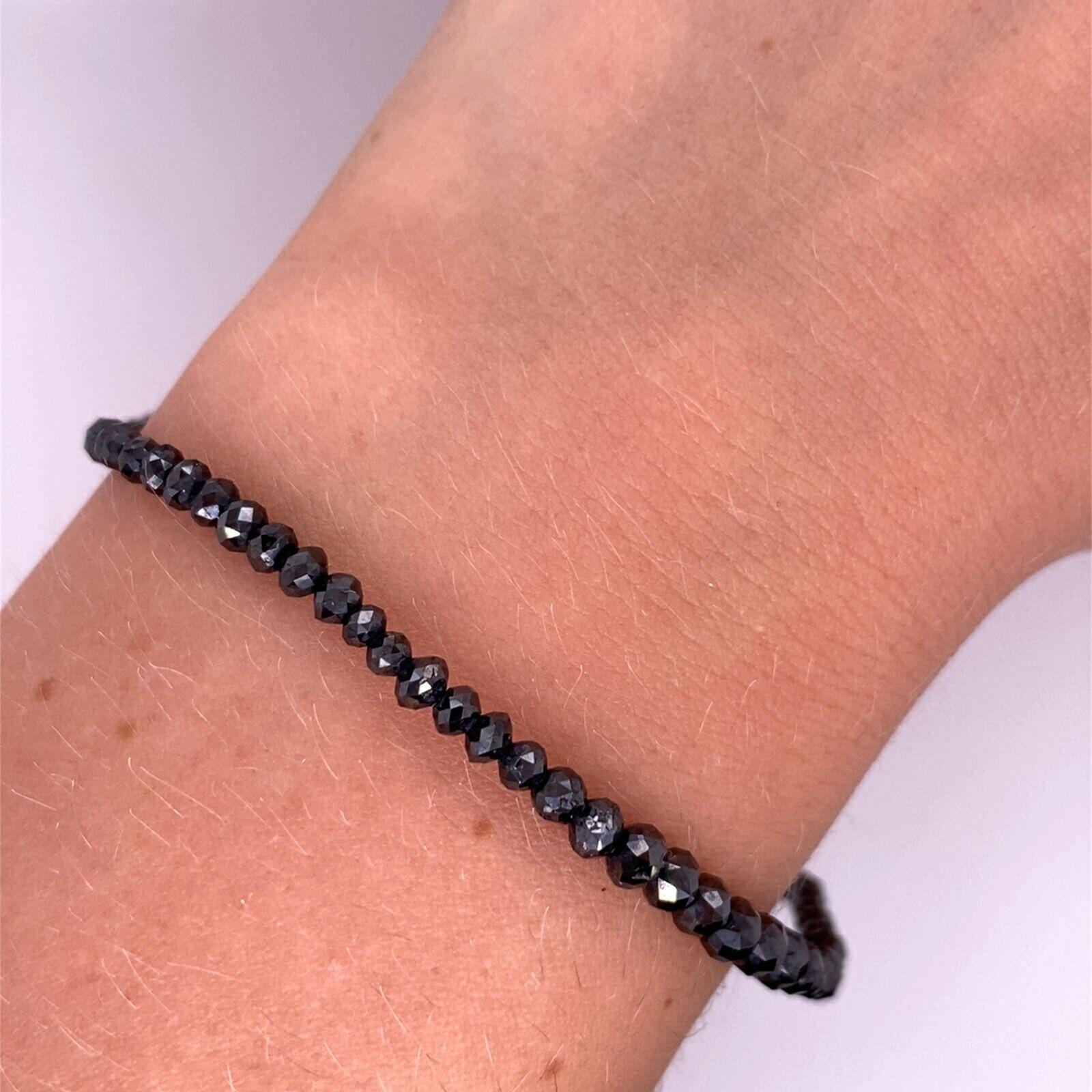 Graduated Natural Black Diamond Bracelet

This Black Diamond bracelet is an elegant piece that is perfect for everyday wear. It is set in Sterling Silver and features 5.0ct graduated natural Black Diamonds. It is secured by a lobster clasp and is
