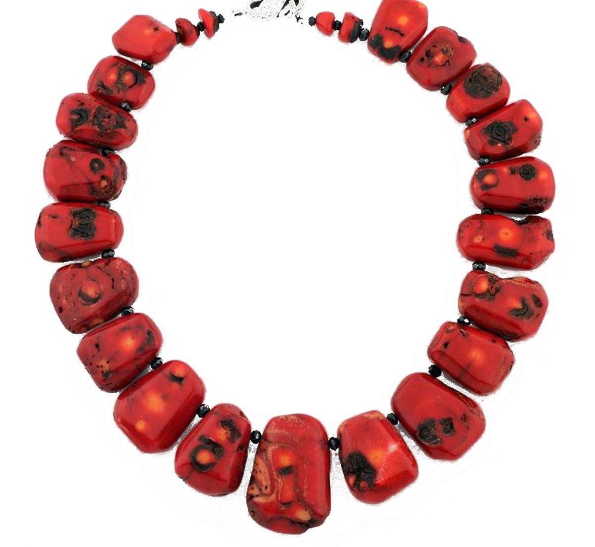 Extraordinary unique very rare graduated gem polished red and red/orangy natural Coral necklace enhanced with black Spinel accents compose this handmade necklace.  This facinating necklace is 19.5 inches in length and the largest coral is 43mm x