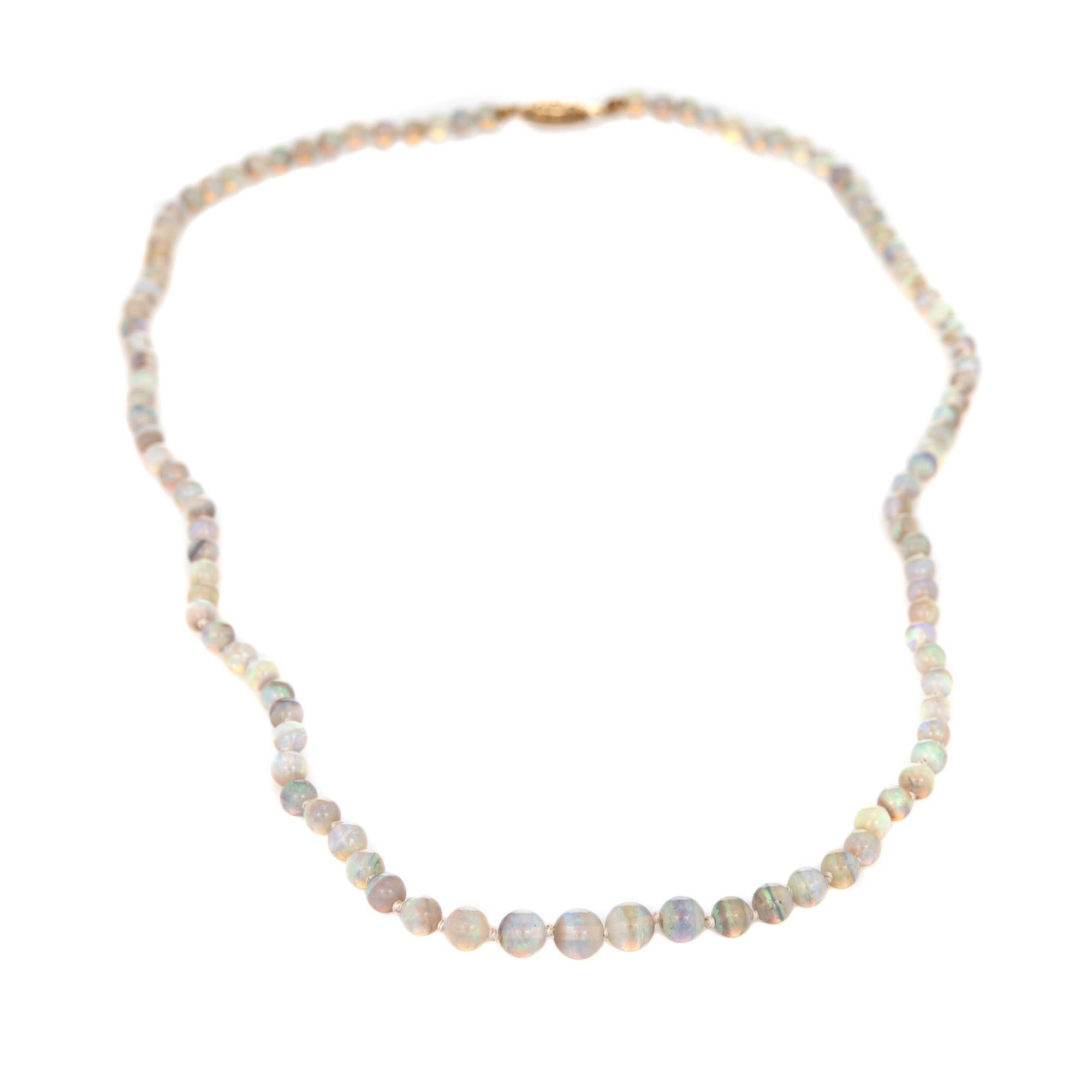 Stylish and finely detailed vintage natural opal bead necklace finished with a 14k yellow gold clasp.  

The opals beads graduate in size from 3.5mm to 6mm. The opals are in excellent condition and free or cracks or chips.
The opal beads graduate in