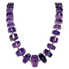 Collier Rondel octogonal gradué en or jaune 14 carats et 18 carats