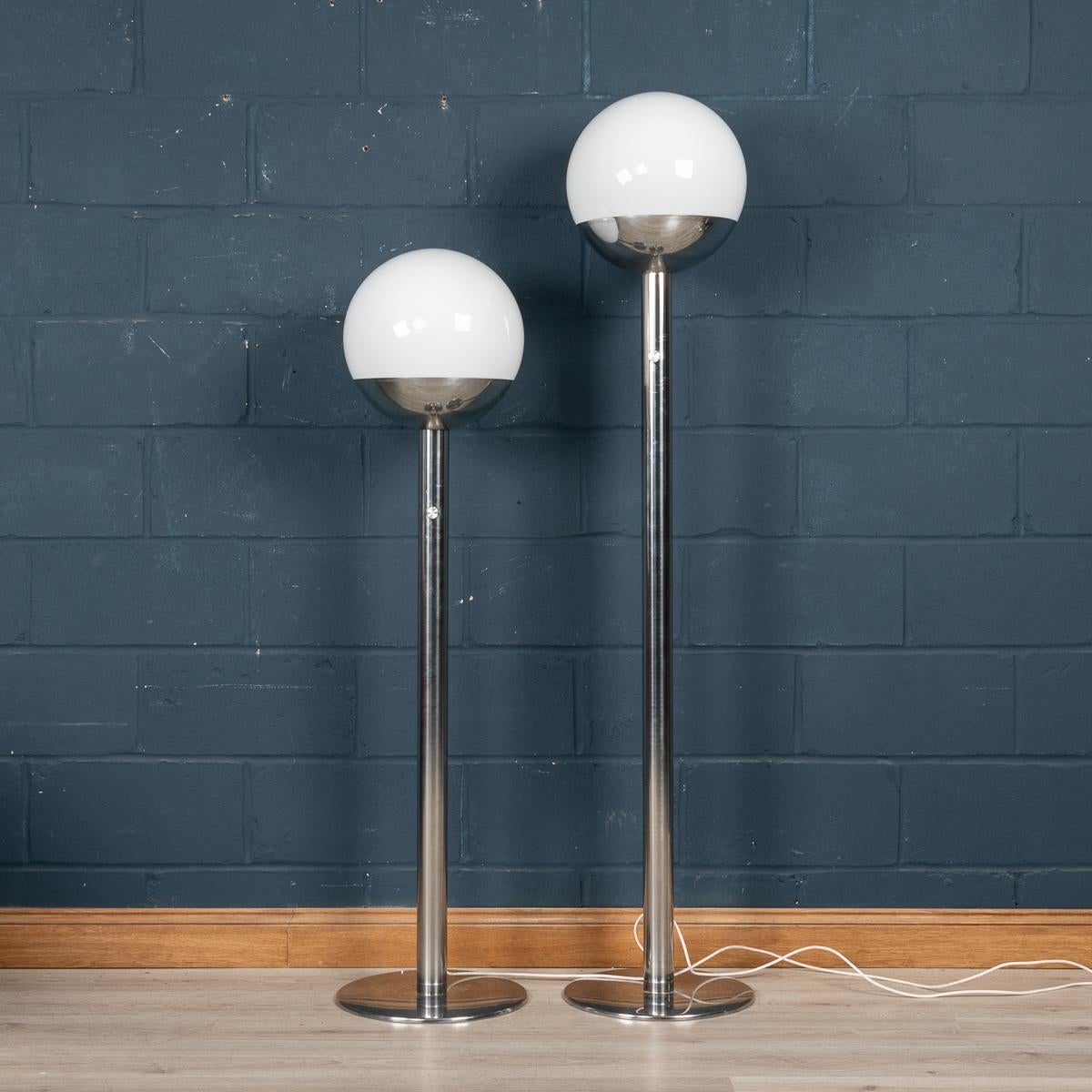 A elegant graduated pair of floor lamps by Pia Guidetti-Crippa. Known as the P428 floor lamp, it was designed in the 1970's and is characterised by the clean lines which was a huge success in the world of interior design and they are very much