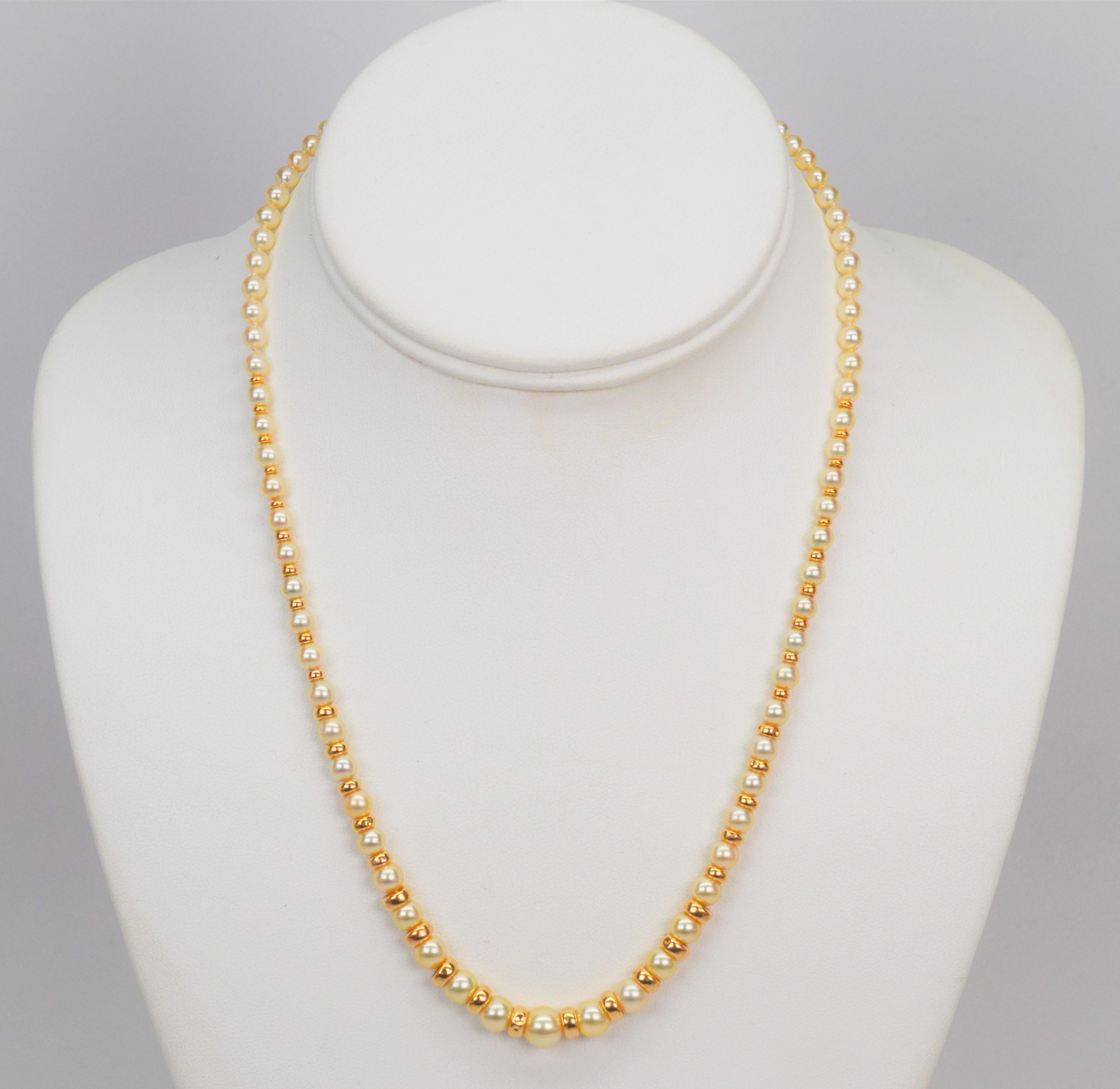 Creamy AA Akoya Pearls ranging from 3.5mm to 7mm are hand strung with alternating fourteen karat 14k yellow gold spacers giving this classic necklace a rich warm tone.
Eighteen inches in length, the pearls with beads smoothly graduate to the center