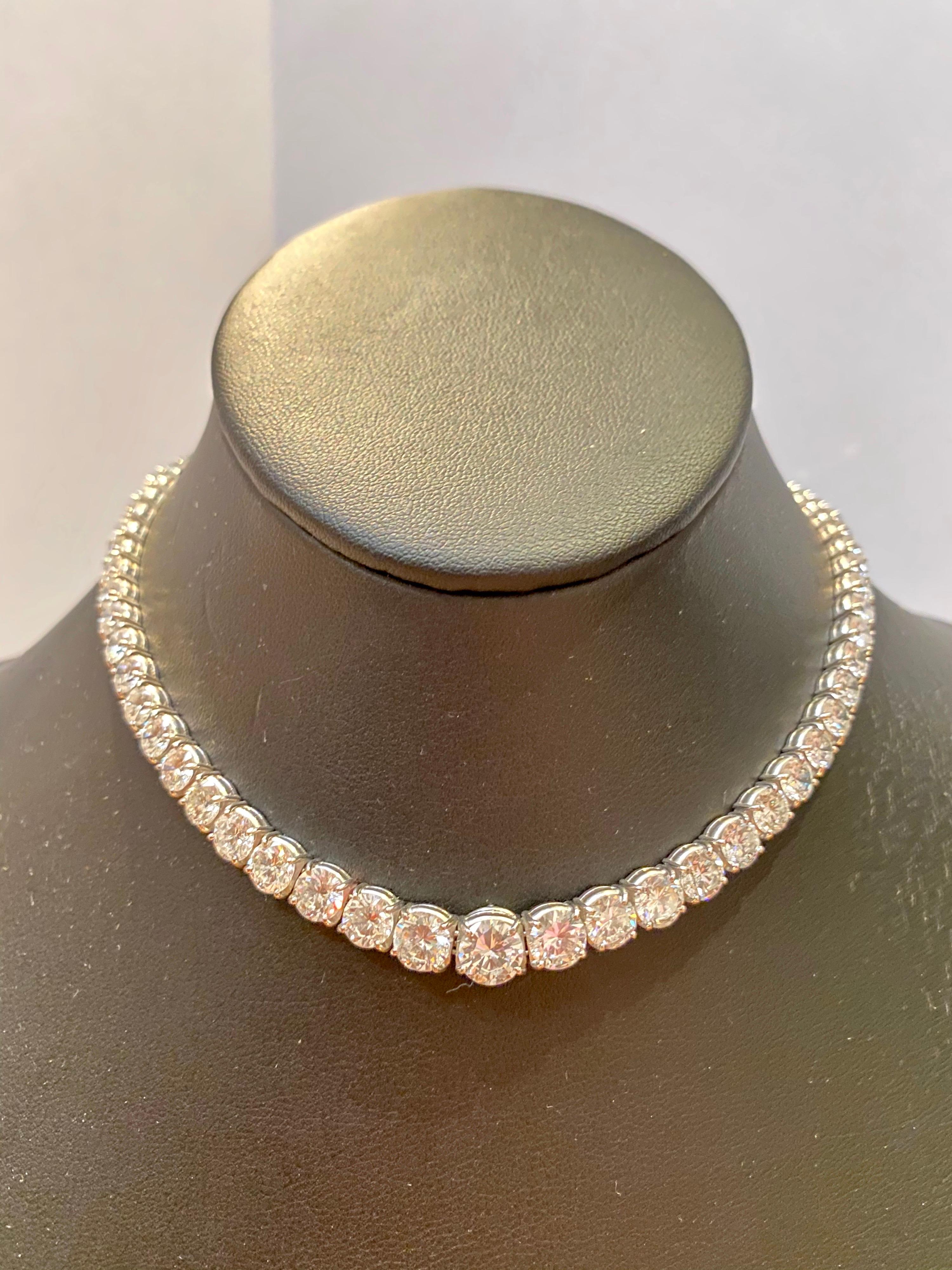 Handmade Platinum Graduated Diamond Necklace set with Round Brilliant Diamonds G color & VS clarity, weighing in total 32.92 carats.

Viewings available in our NYC wholesale office by appointment.
Please contact us for more information. 

All items