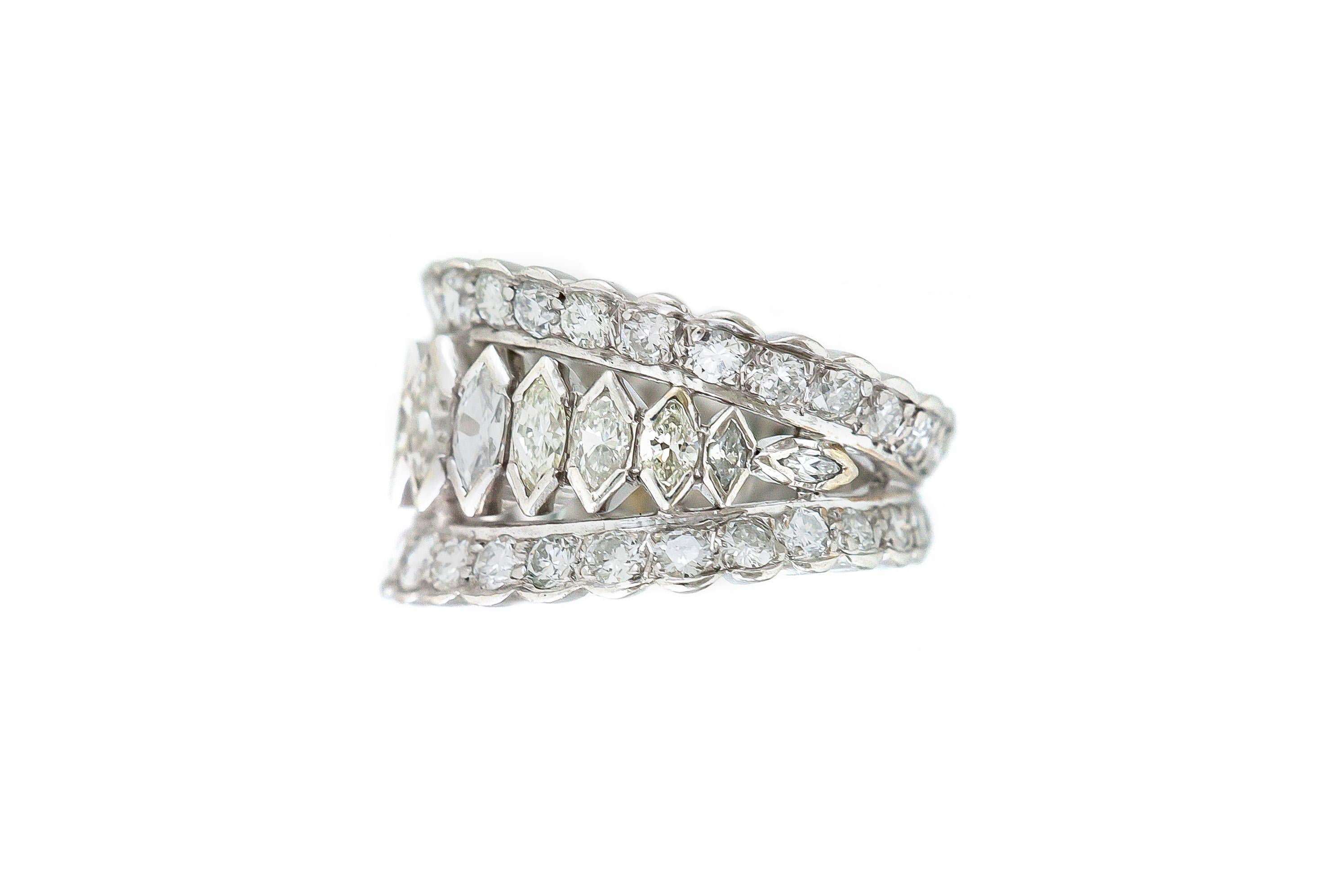 The ring is finely crafted in platinum with marquise and round cut diamonds weighing approximately total of 3.00 carat.
Carat 1950.
