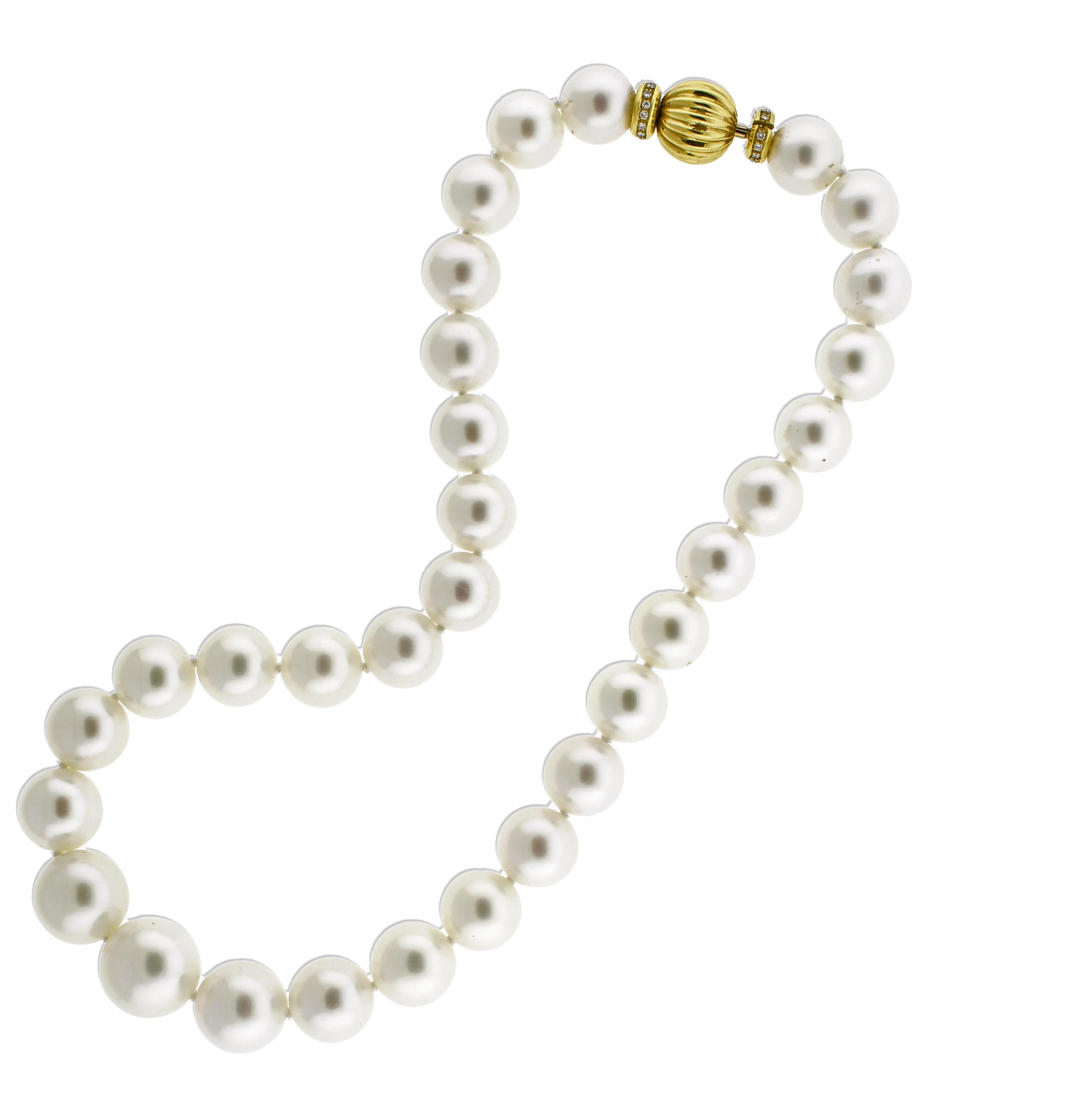 Indulge in elegance with this exquisite Graduated South Sea Pearl Necklace, featuring pearls of exceptional quality ranging from 12.1mm to 15.6mm. The lustrous pearls showcase a captivating natural sheen and are meticulously hand-strung to create a