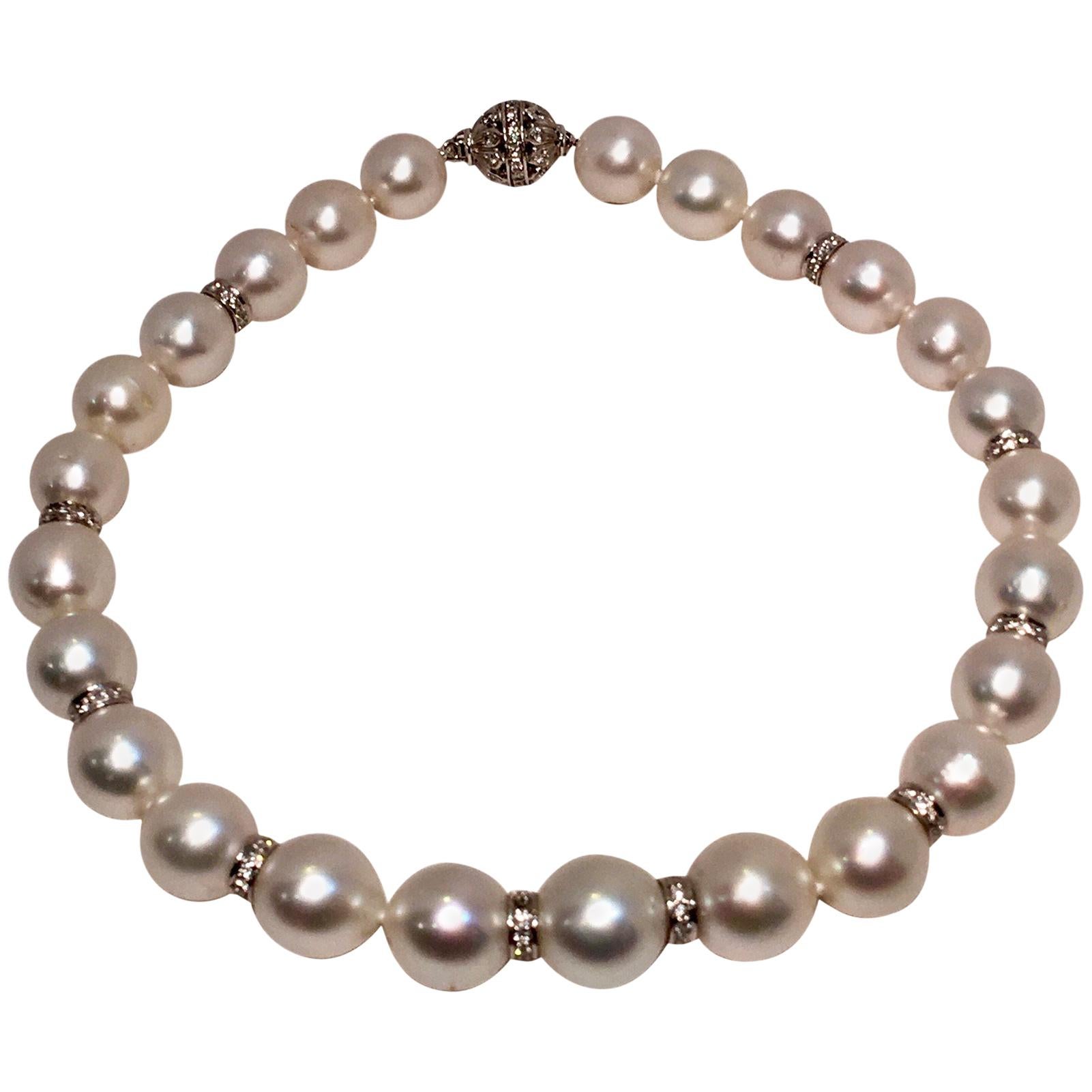 Graduated Strand of Large White South Sea Pearls with Diamonds in White Gold