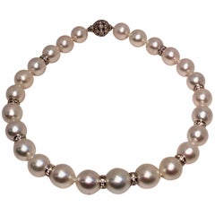 Graduated Strand of Large White South Sea Pearls with Diamonds in White Gold