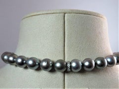 Graduated Tahitian Black Pearl Necklace with Platinum Diamond Plunger Clasp