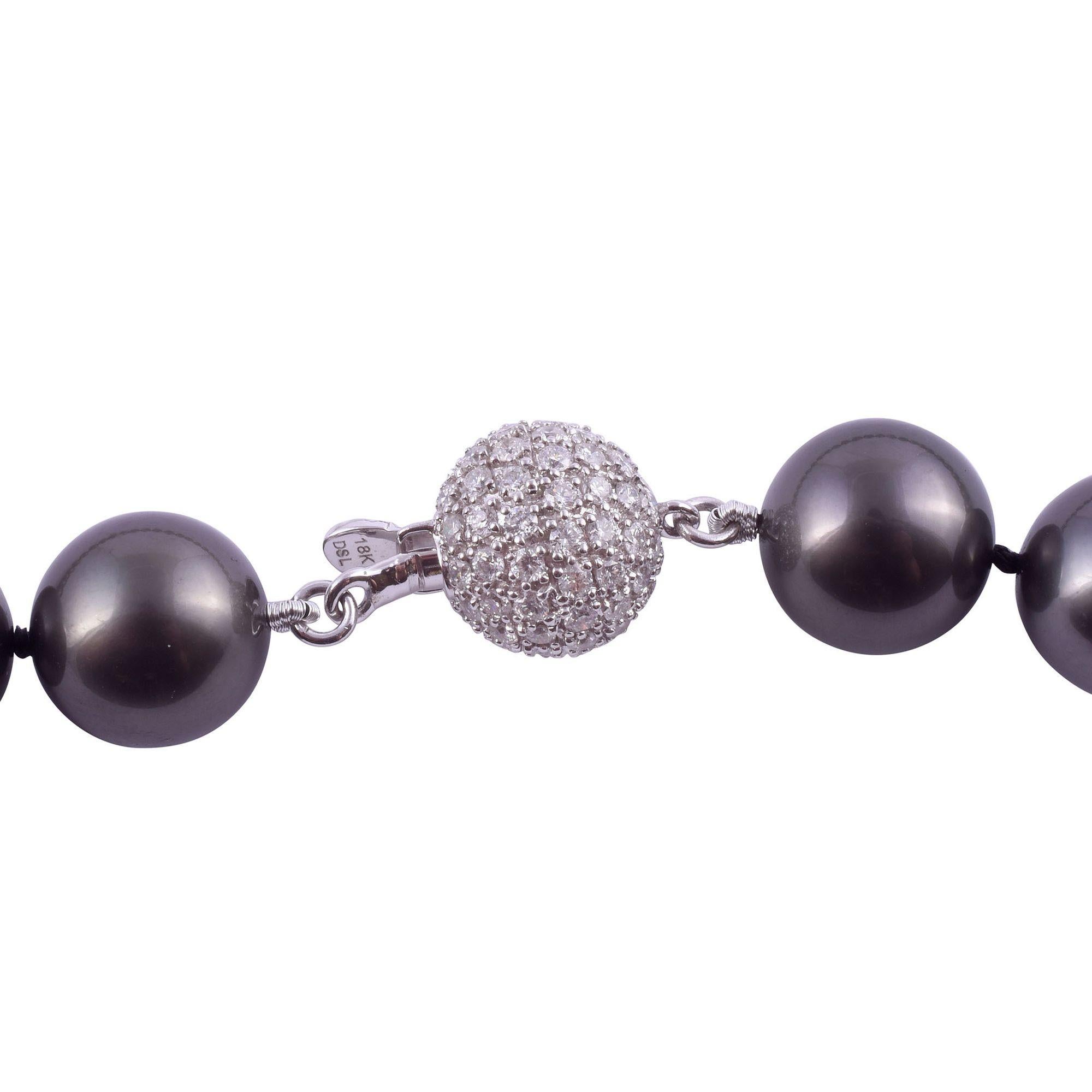 Estate very fine graduated Tahitian pearl necklace with diamond clasp. This beautiful necklace features 37 graduated cultured Tahitian pearls that measure 11.1-14.4mm. These pearls are dark grey black in color, have very good to excellent luster,