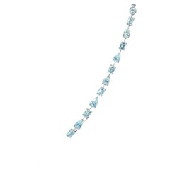 Bracelet tennis avec diamants taille poire et émeraude gradués de 13,63 carats