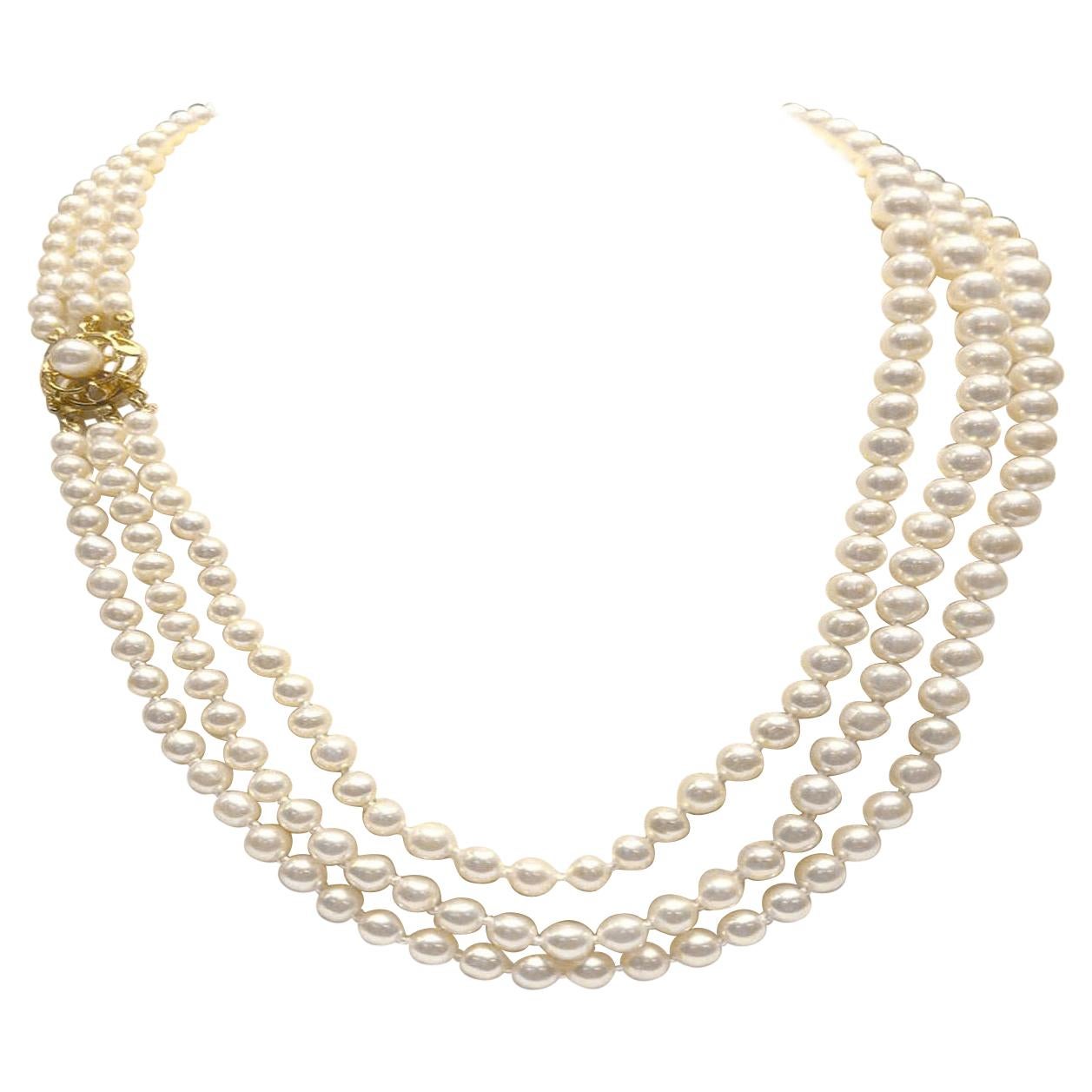 Graduating Akoya Pearls with a 14k Yellow Clasp For Sale