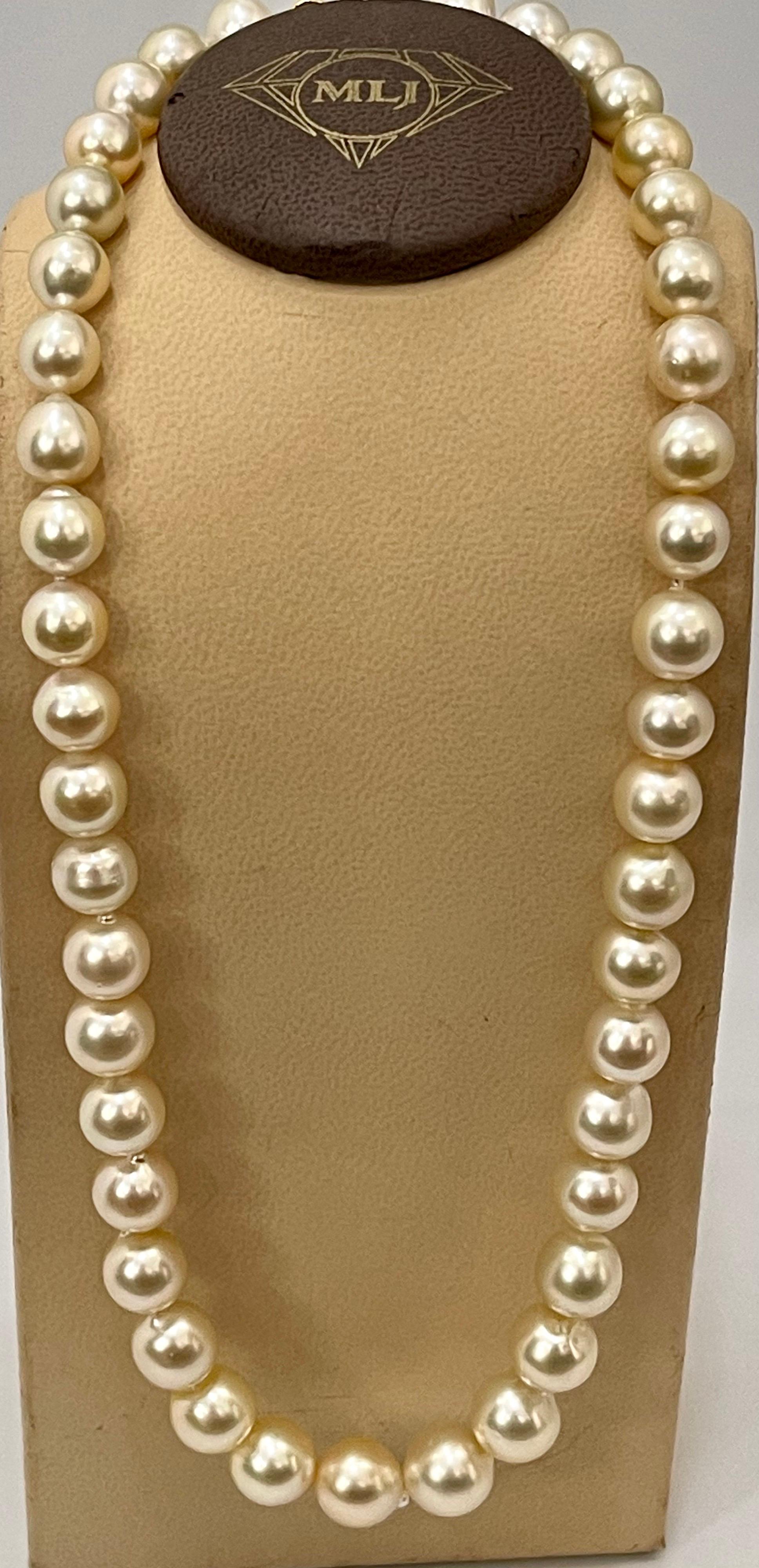 Graduating Cream Color South Sea Pearls Necklace 14 Karat Yellow Gold Clasp For Sale 5