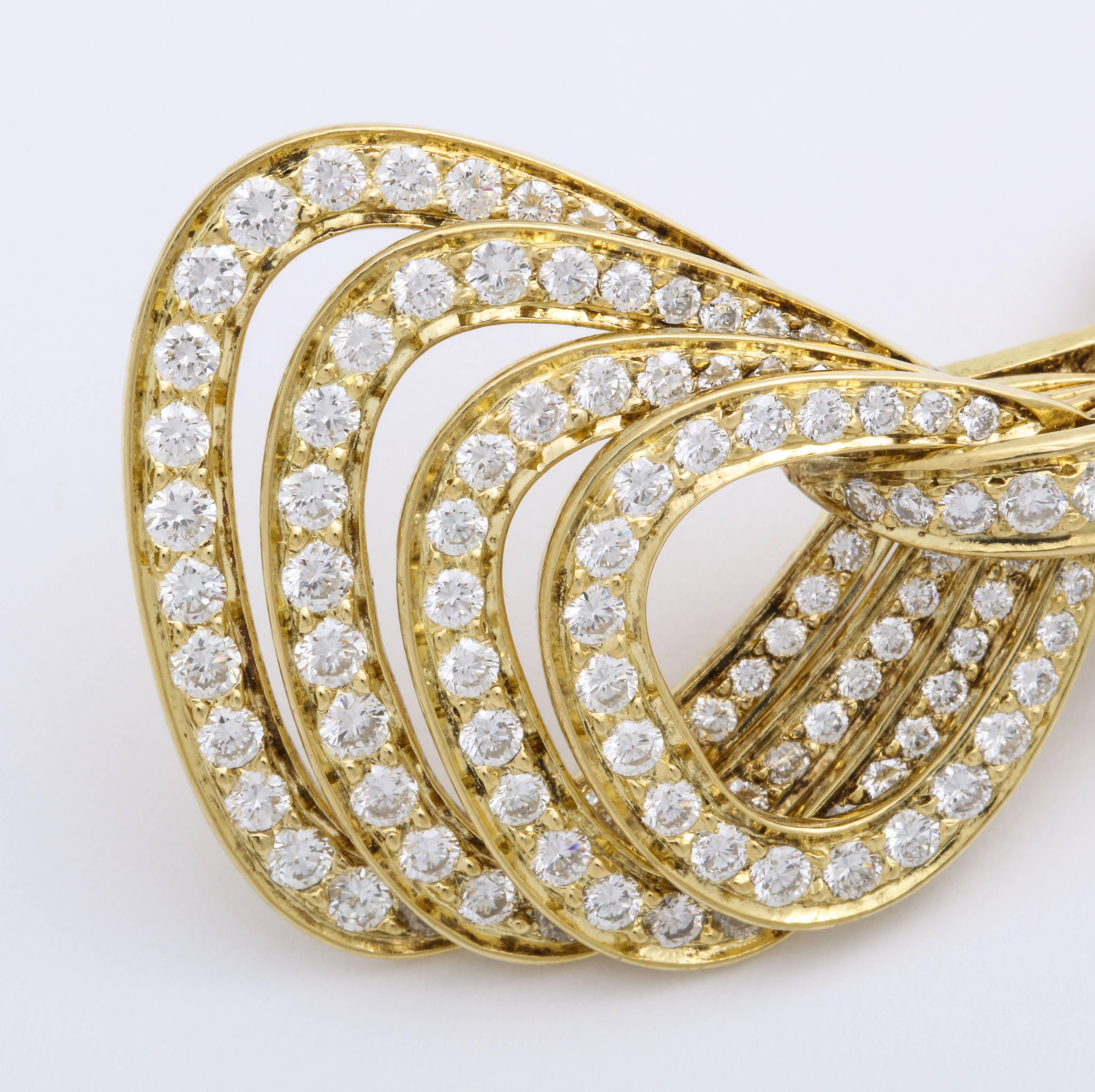 Round Cut Graduating Quadruple Diamond and 18 Karat Yellow Gold Pendant Earrings For Sale