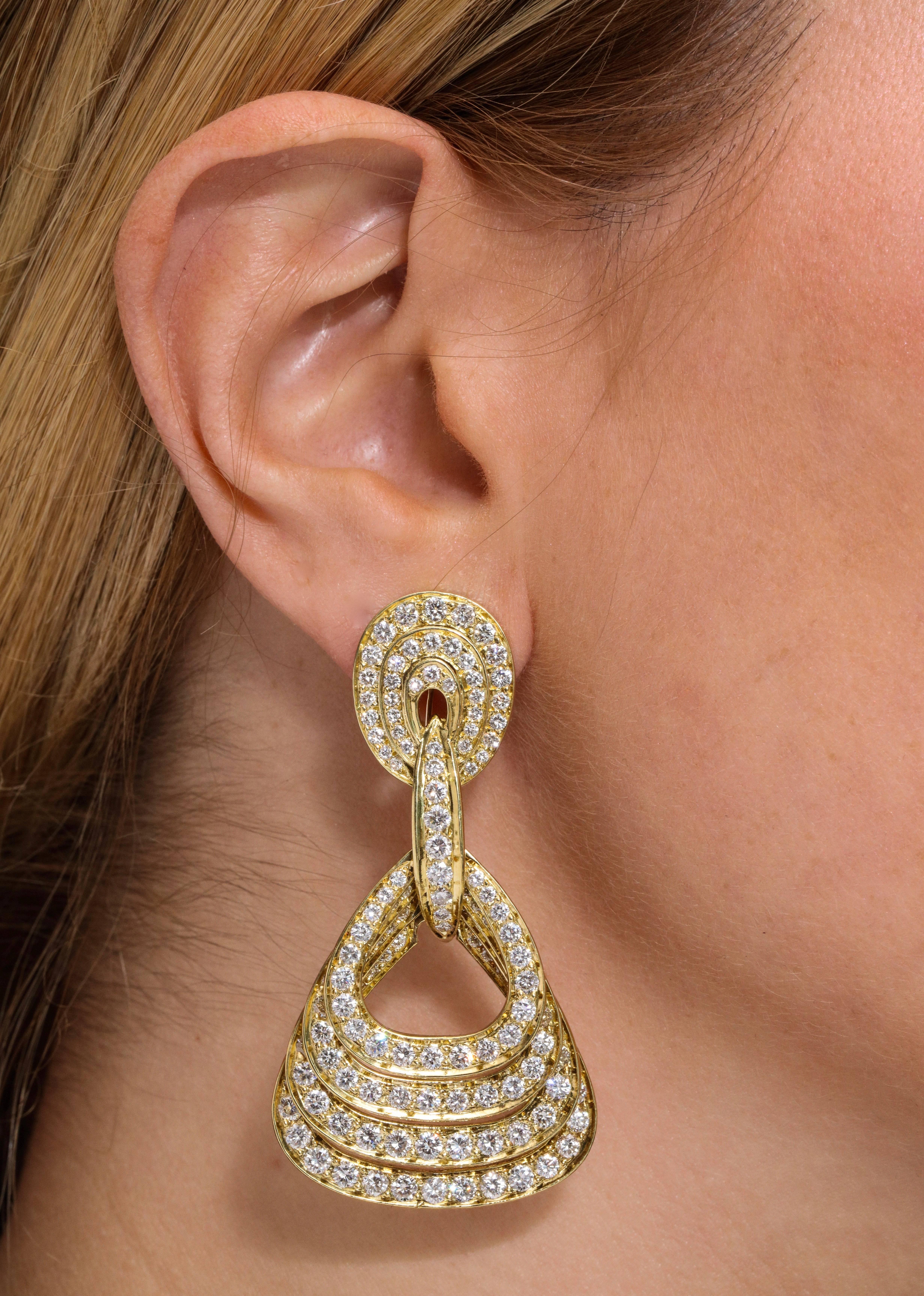 Women's Graduating Quadruple Diamond and 18 Karat Yellow Gold Pendant Earrings For Sale