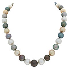 Graduating South
Sea
Tahitian Pearls Necklacew / Tri Color 14k Ball Clasp Vintage Graduating South
Sea
Tahitian Pearls Necklacew / Tri Color 14k Ball Clasp
