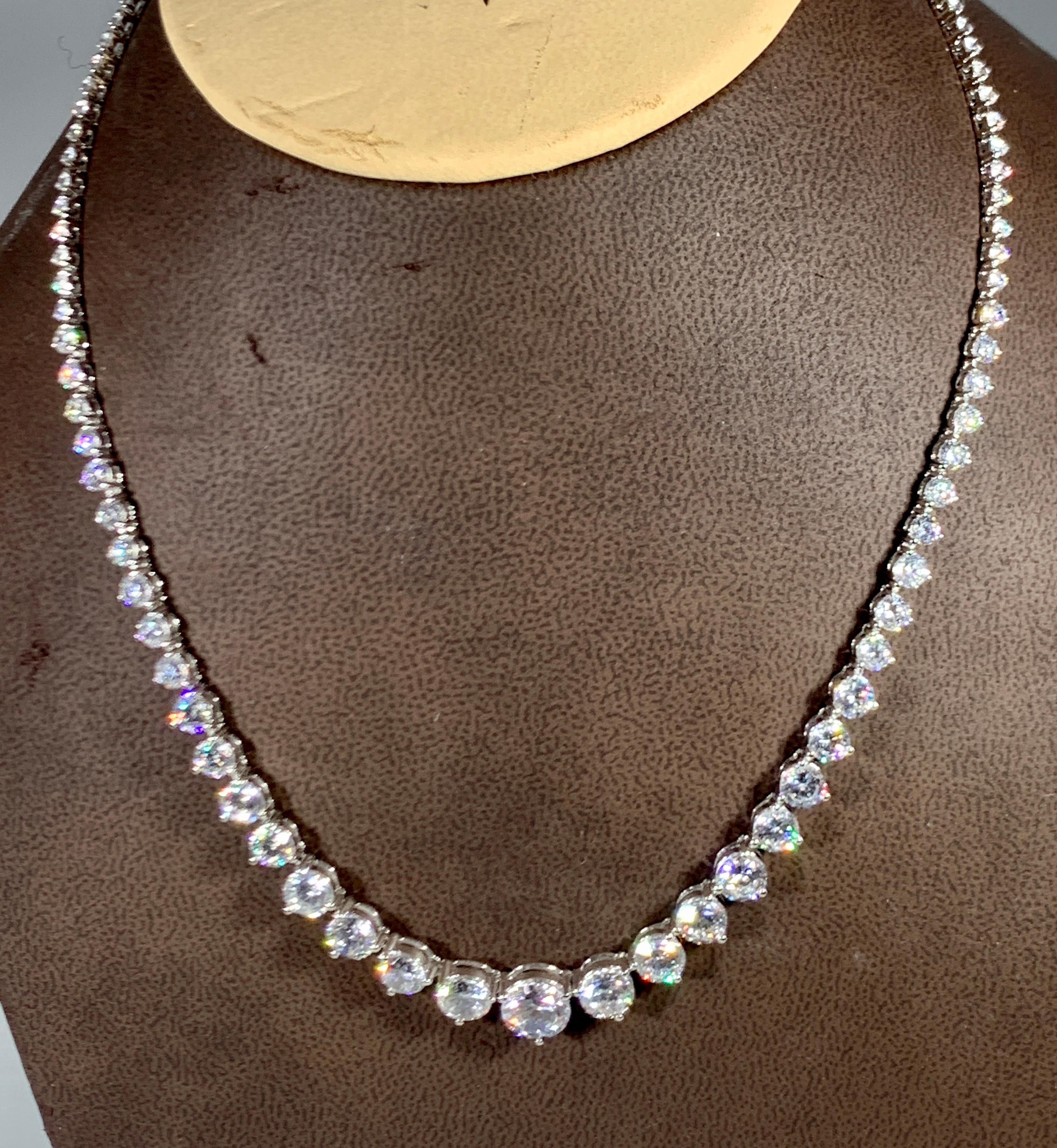 Cubic Zirconia or CZ is the cubic Crystalline form Of Zirconium dioxide. Its Hard and Usually colorless.
This Necklace amazing . Just looks like diamonds .
This prong set cubic zirconia tennis necklace is set in a smooth sterling silver design.